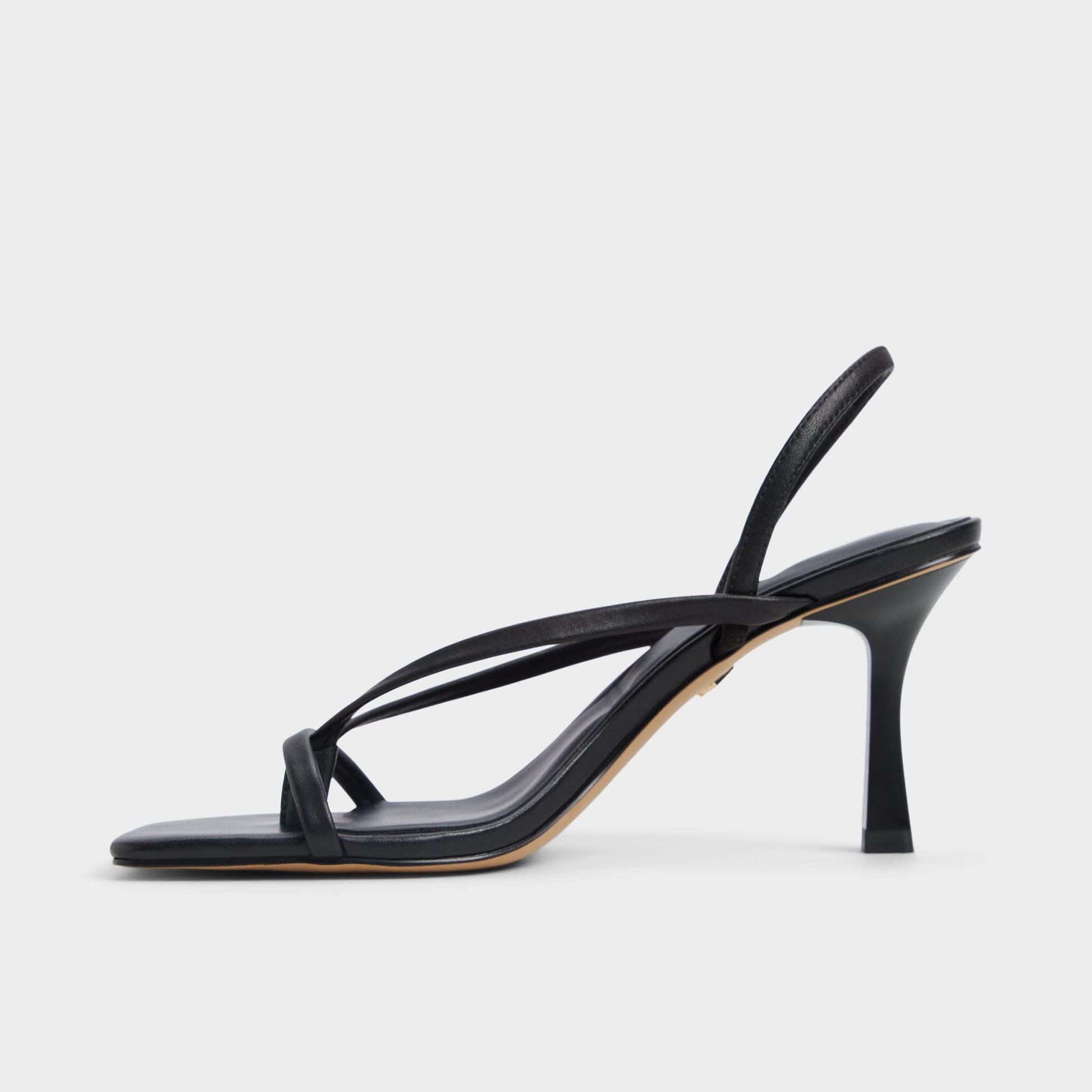 Side view of Other Black Riva Sling back heeled sandal