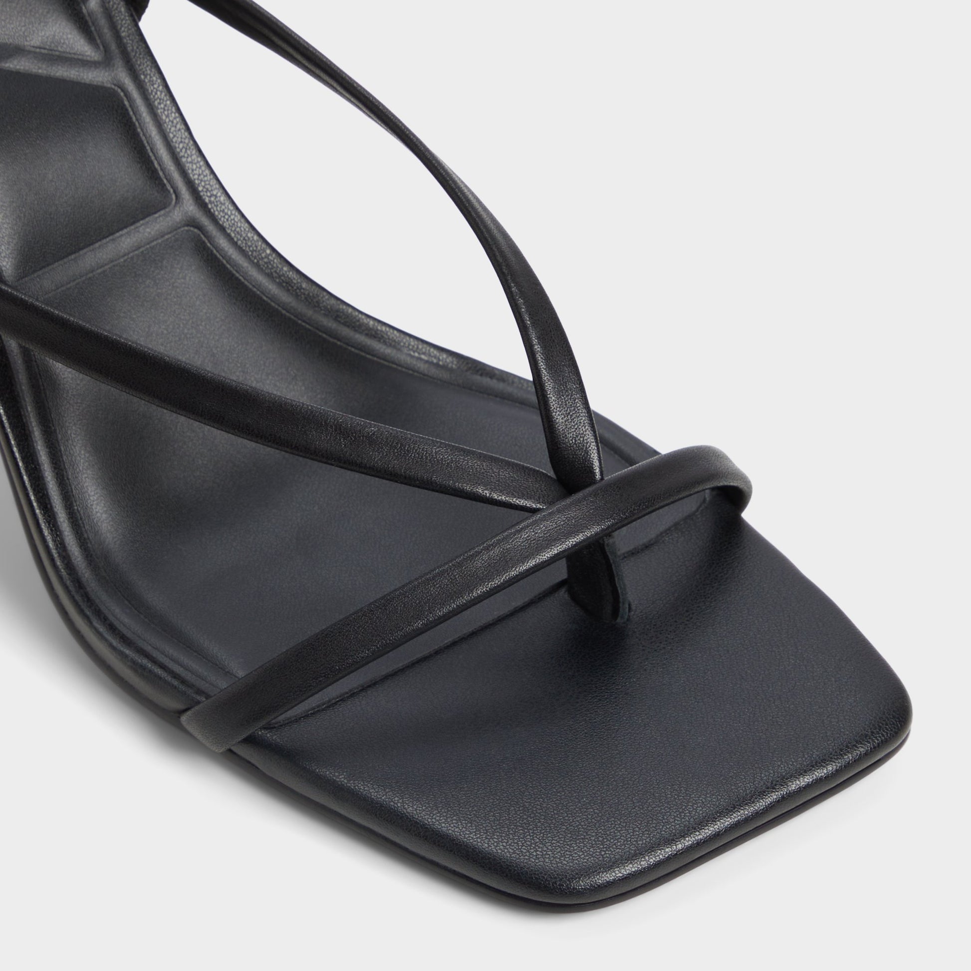 Close-up of the Other Black Riva Sling back heeled sandal