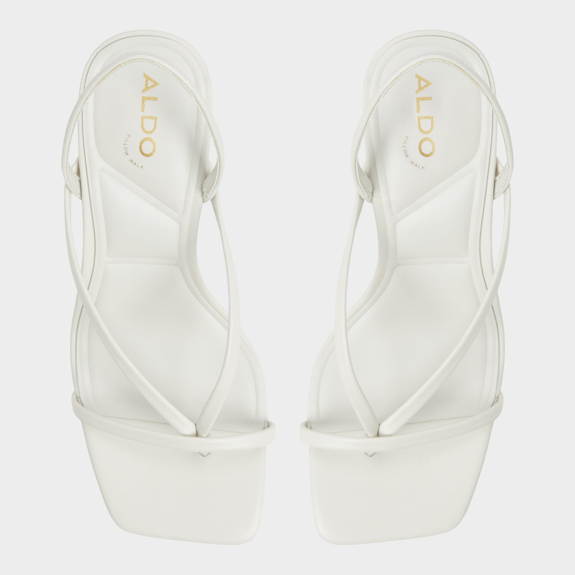 Top-down view of the White/Bone Riva Sling back heeled sandal