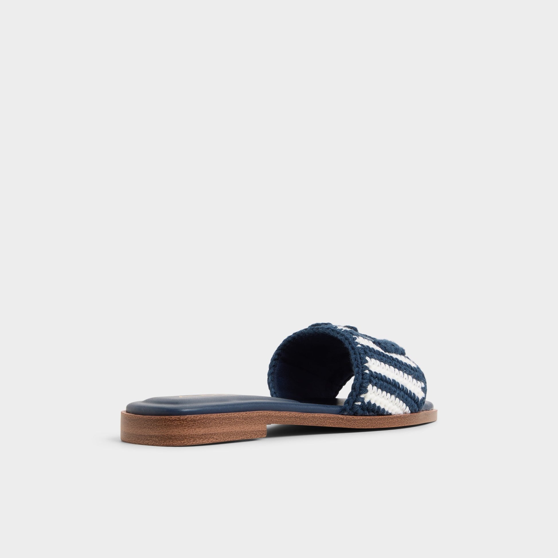 Three-quarter angle of Blue Combo Sabbia Slide sandal's back side