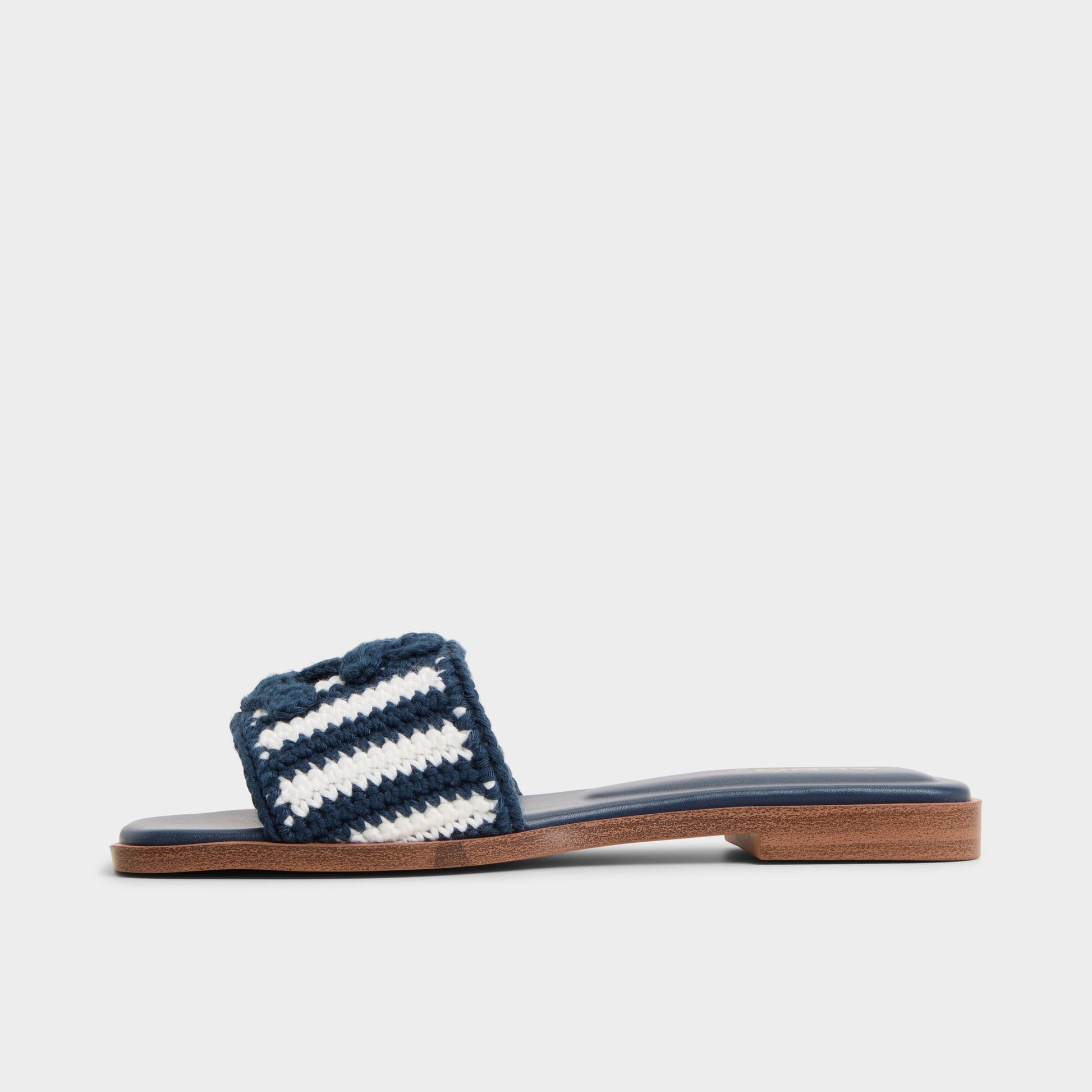 Side view of Blue Combo Sabbia Slide sandal
