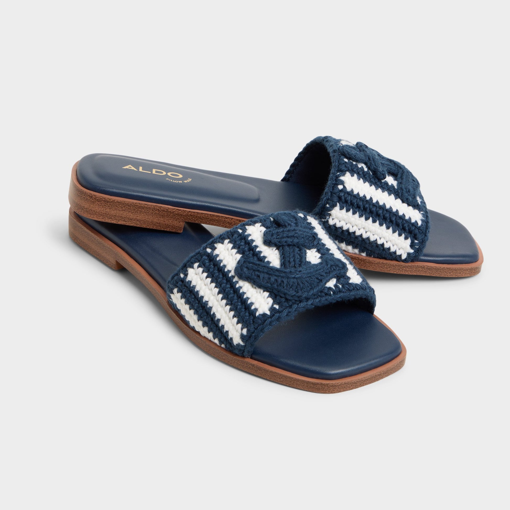 Highlighted view of a pair of Blue Combo Sabbia Slide sandals
