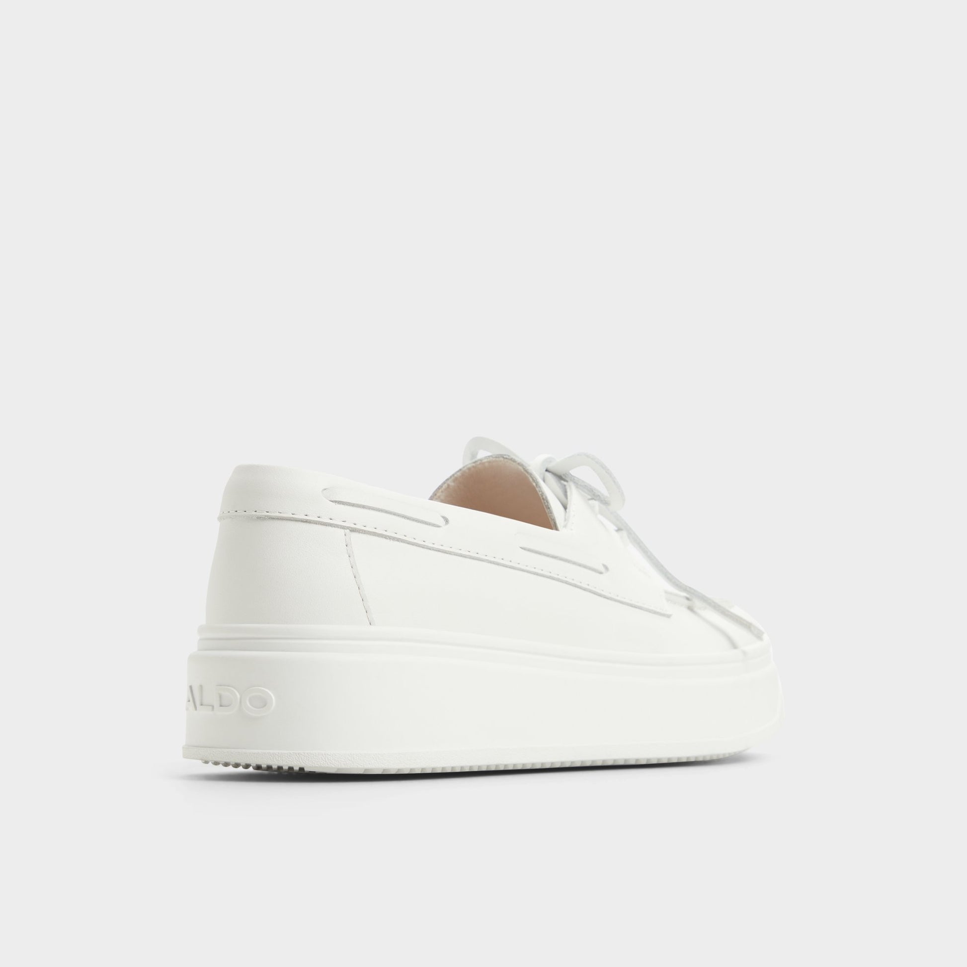 Three-quarter angle of Open White Wildbreeze Boat shoe's back side