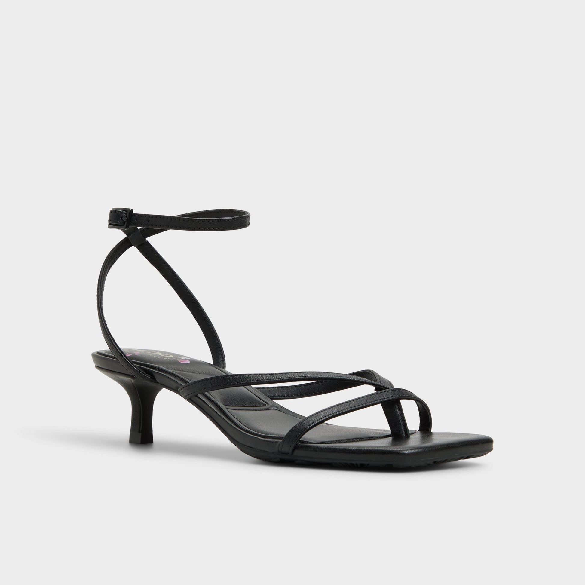 Three-quarter angle of Black Soffie Strappy heeled sandal's front side