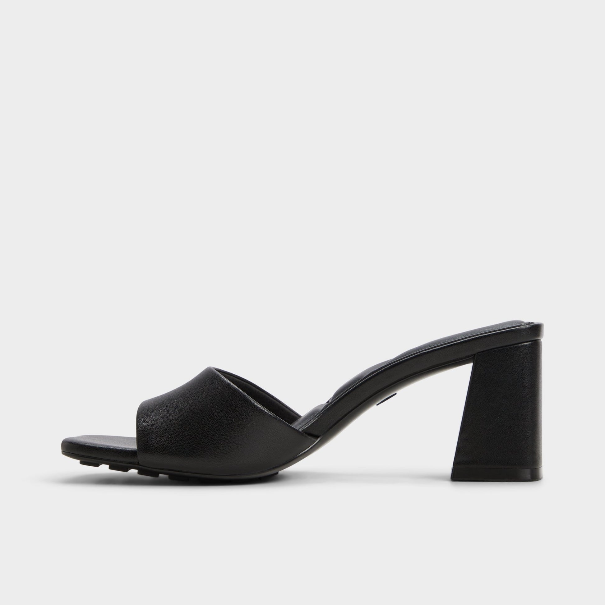 Side view of Black Tisha Heeled mule