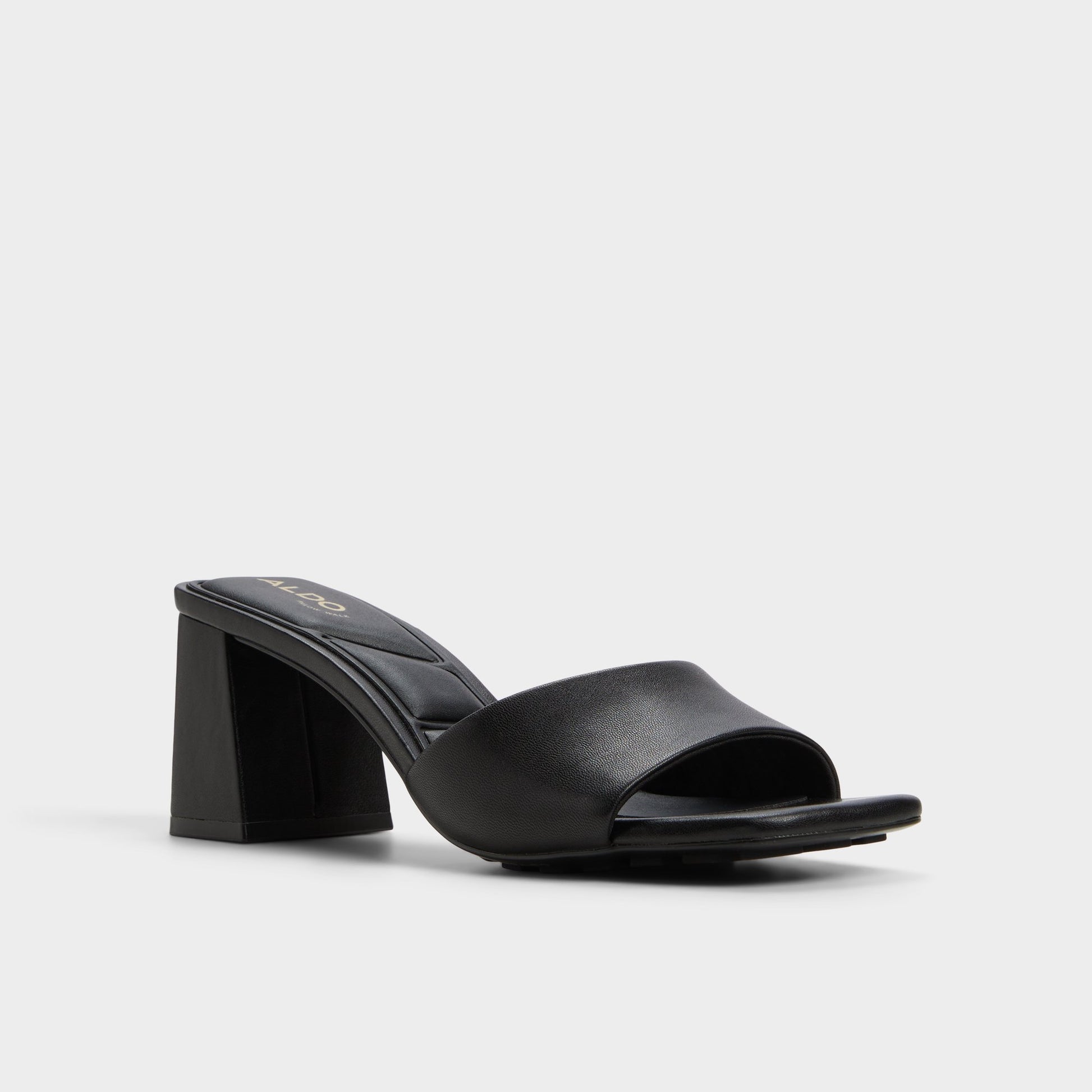 Three-quarter angle of Black Tisha Heeled mule's front side