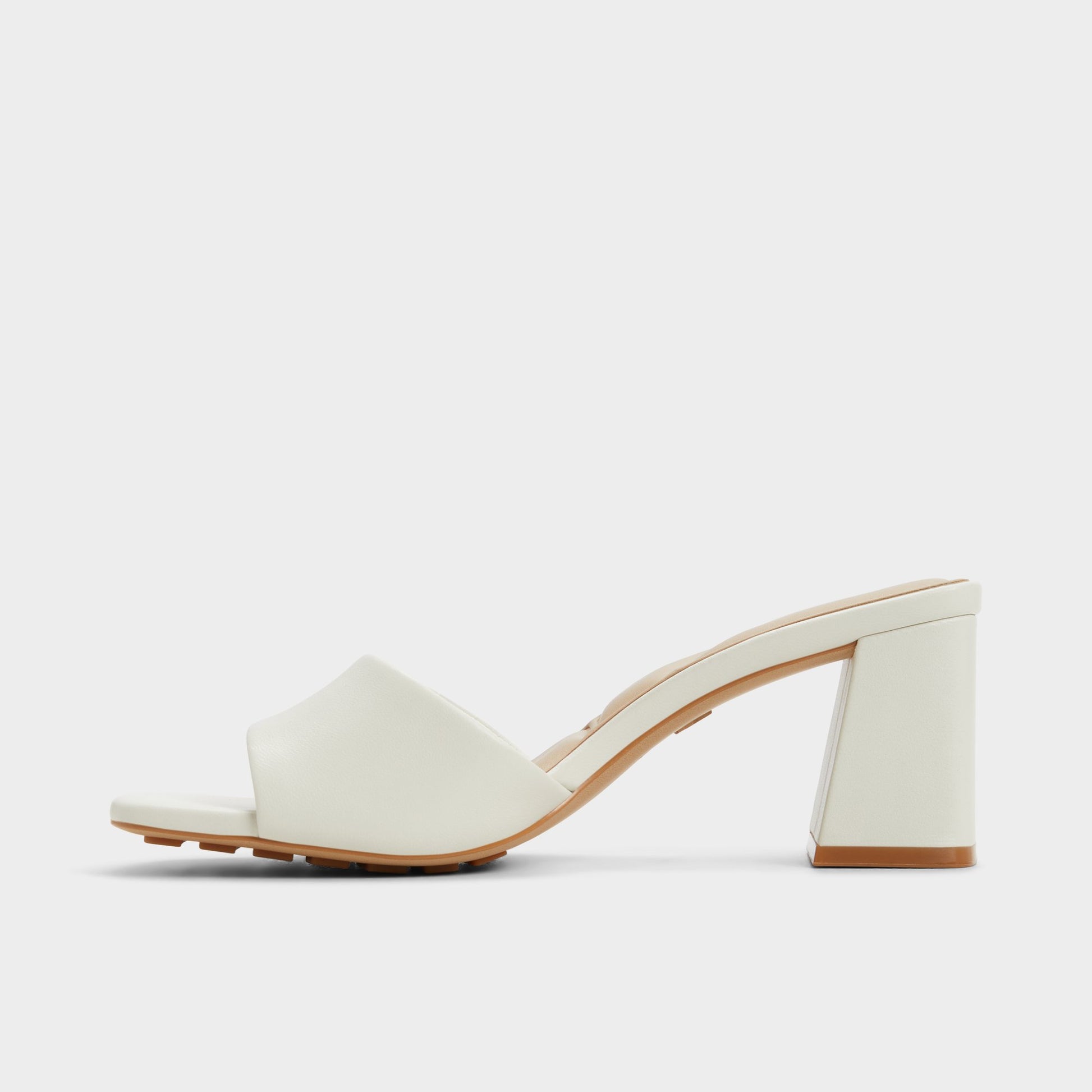 Side view of White Tisha Heeled mule
