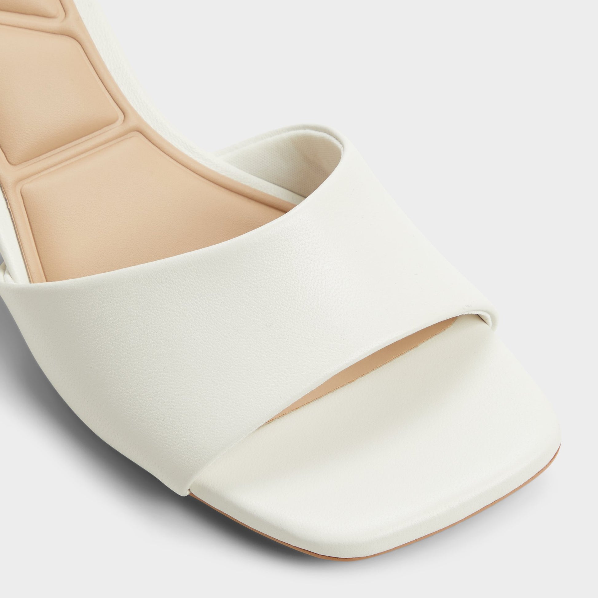 Close-up of the White Tisha Heeled mule