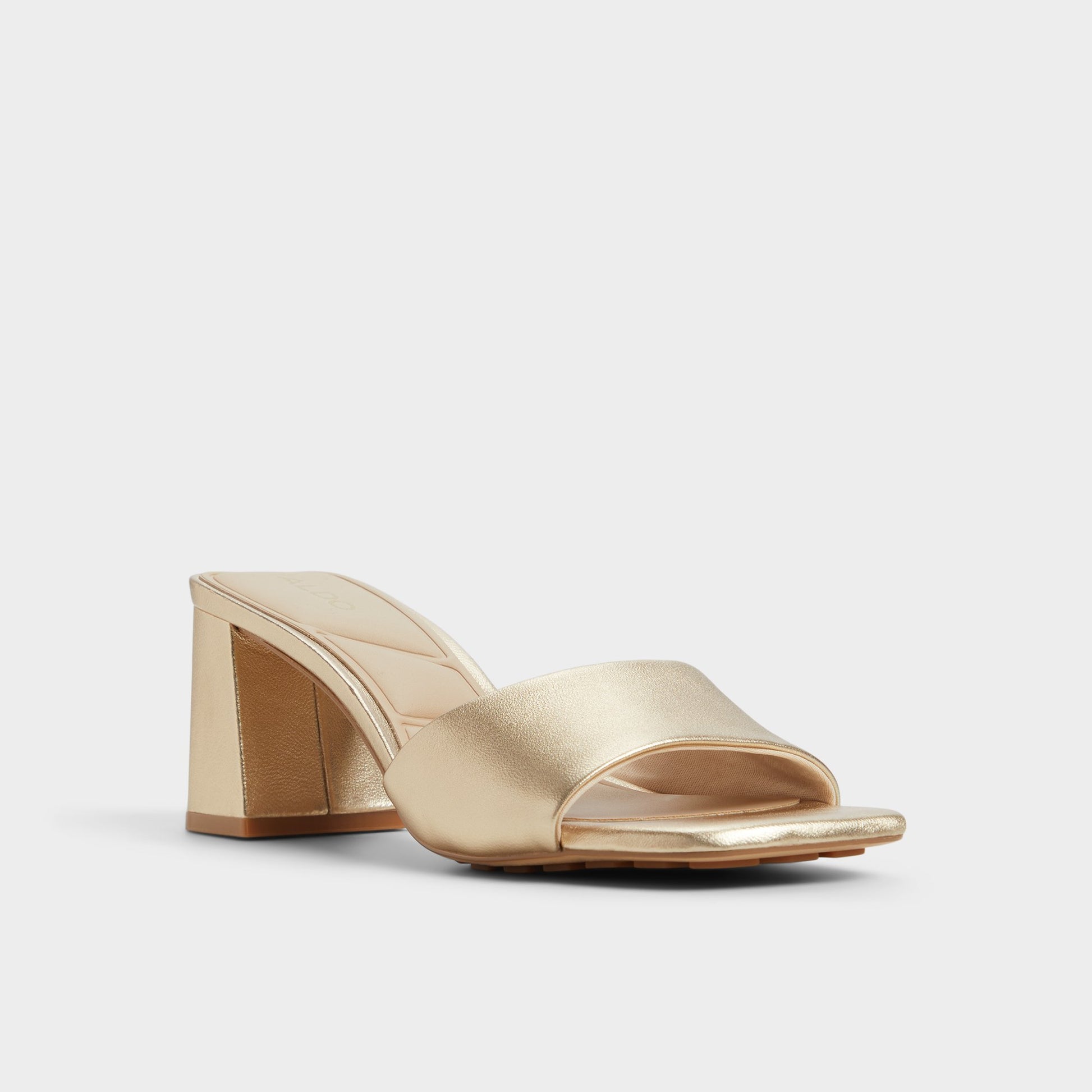 Three-quarter angle of Gold Tisha Heeled mule's front side