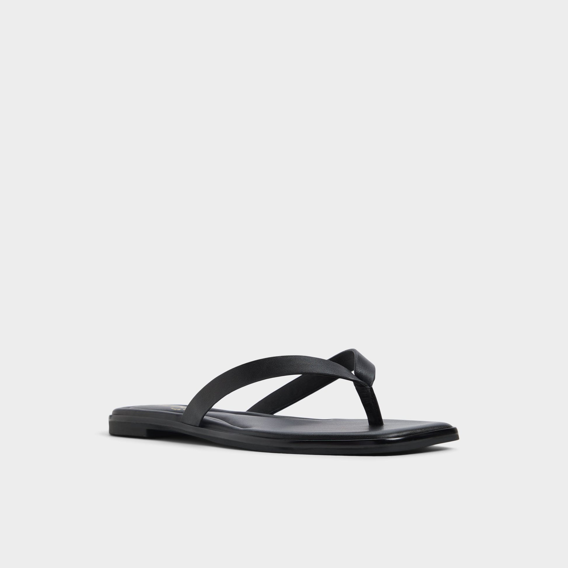 Three-quarter angle of Black Theao Flip flop's front side