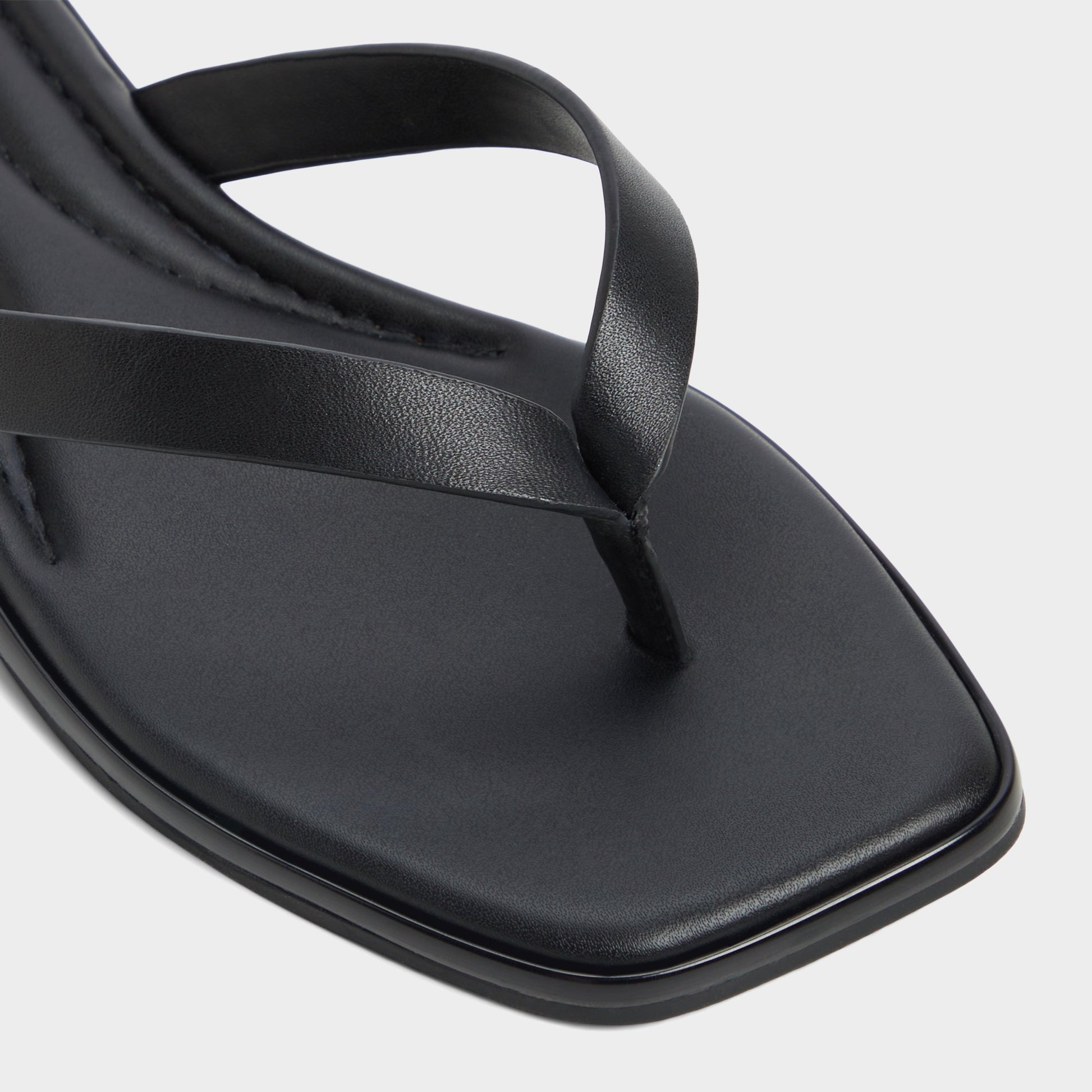 Close-up of the Black Theao Flip flop