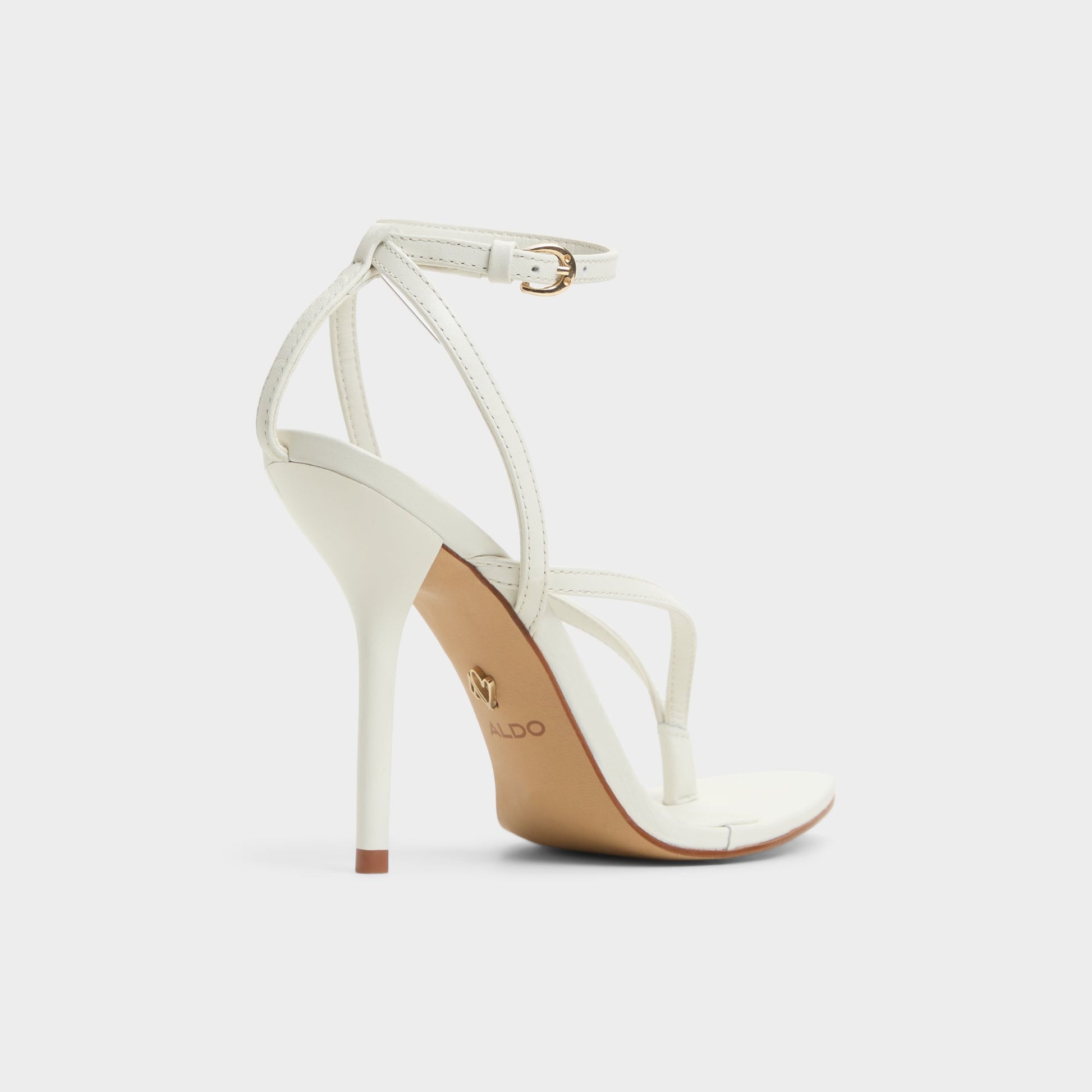 Three-quarter angle of White/Bone Abyfindley Heeled flip flop's back side
