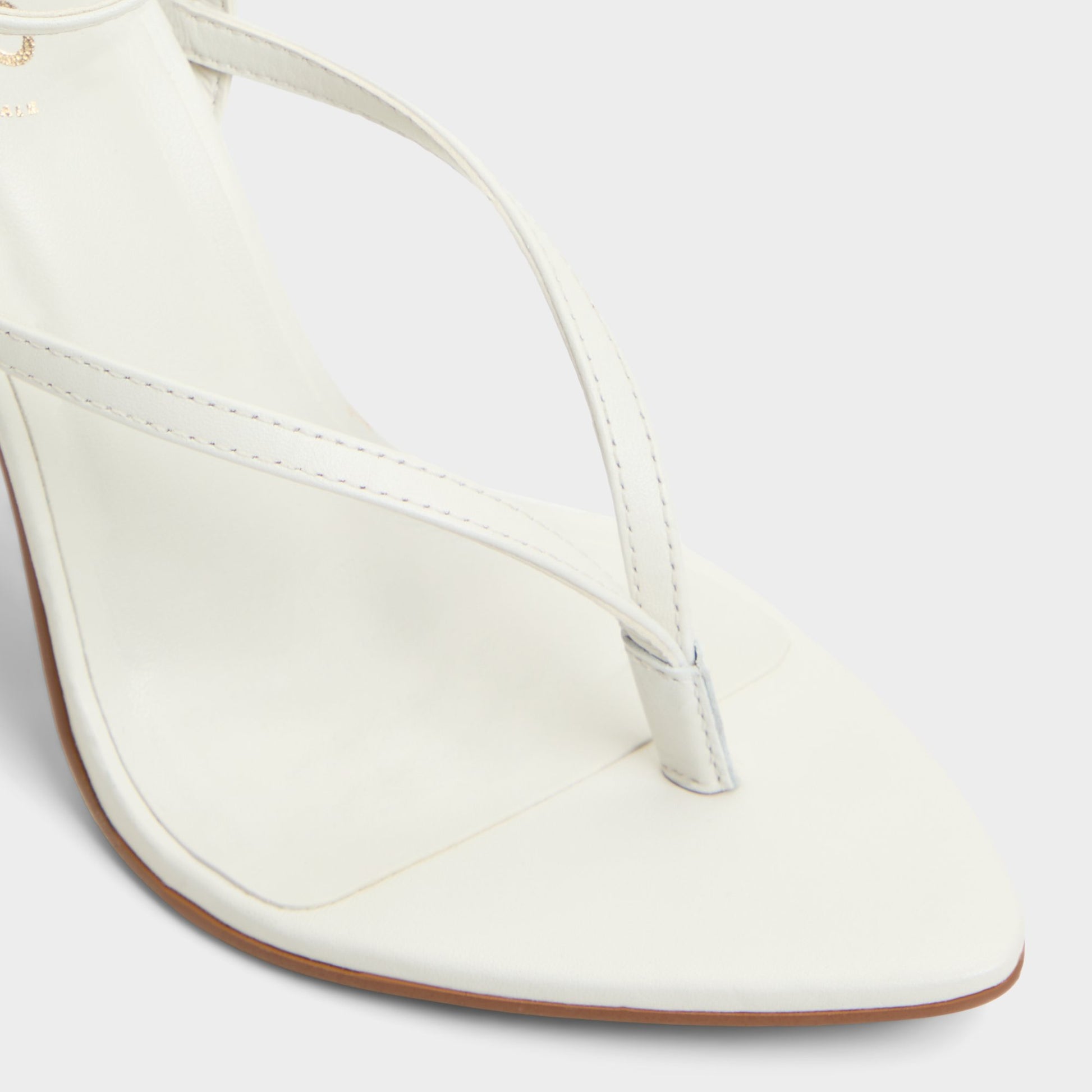 Close-up of the White/Bone Abyfindley Heeled flip flop