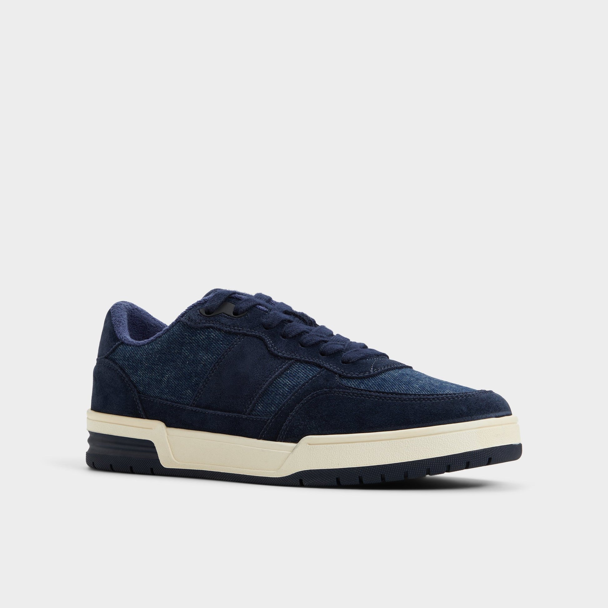 Three-quarter angle of Denim Topper Low top sneaker's front side