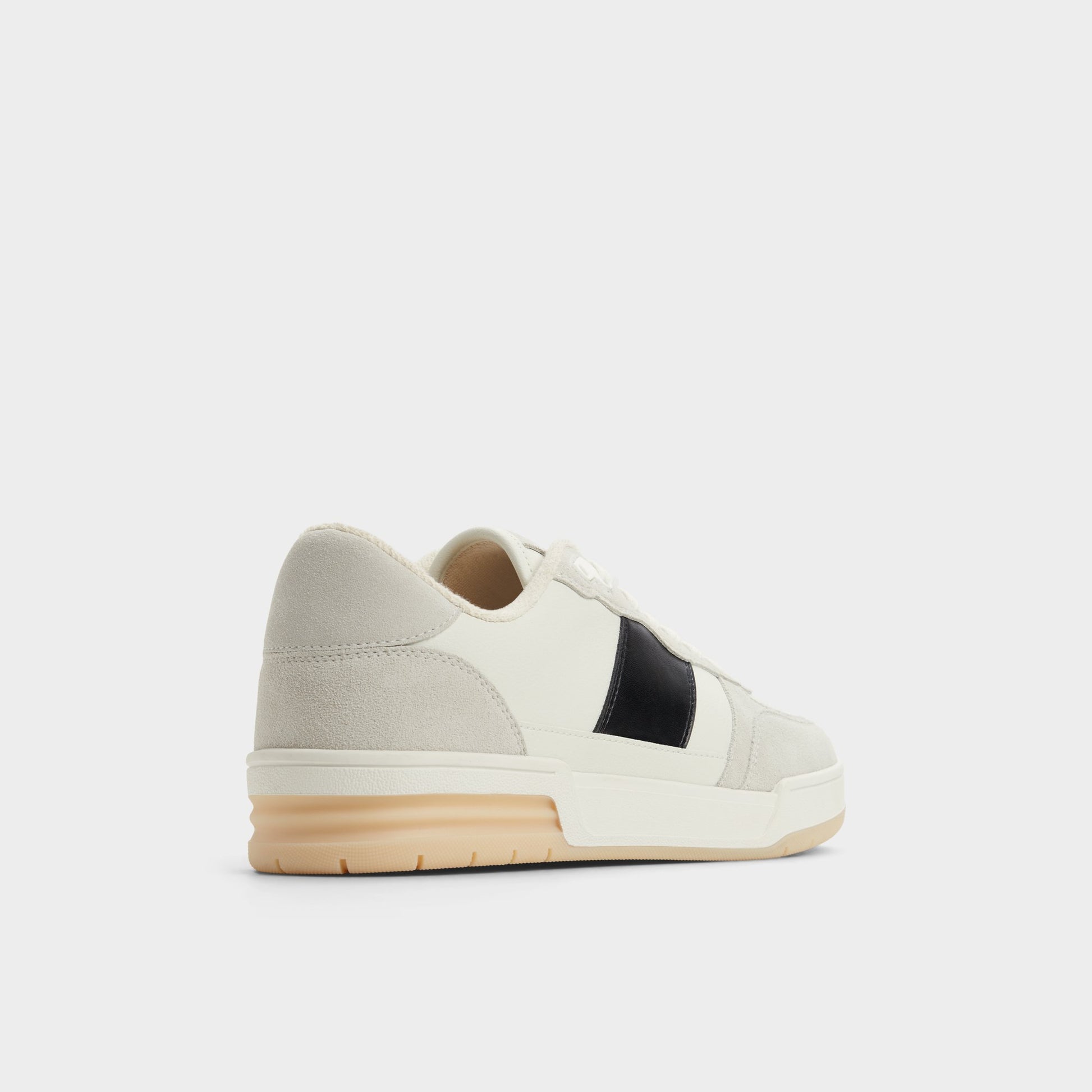 Three-quarter angle of Ivory Topper Low top sneaker's back side