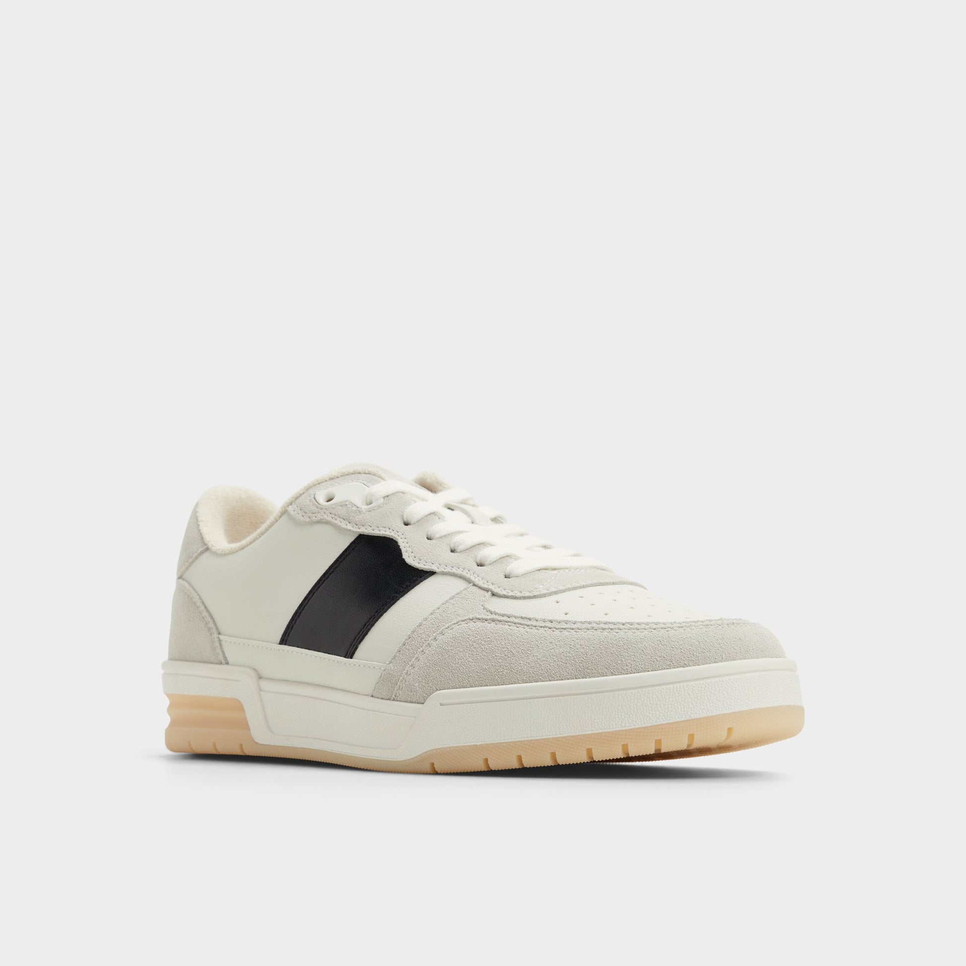 Three-quarter angle of Ivory Topper Low top sneaker's front side