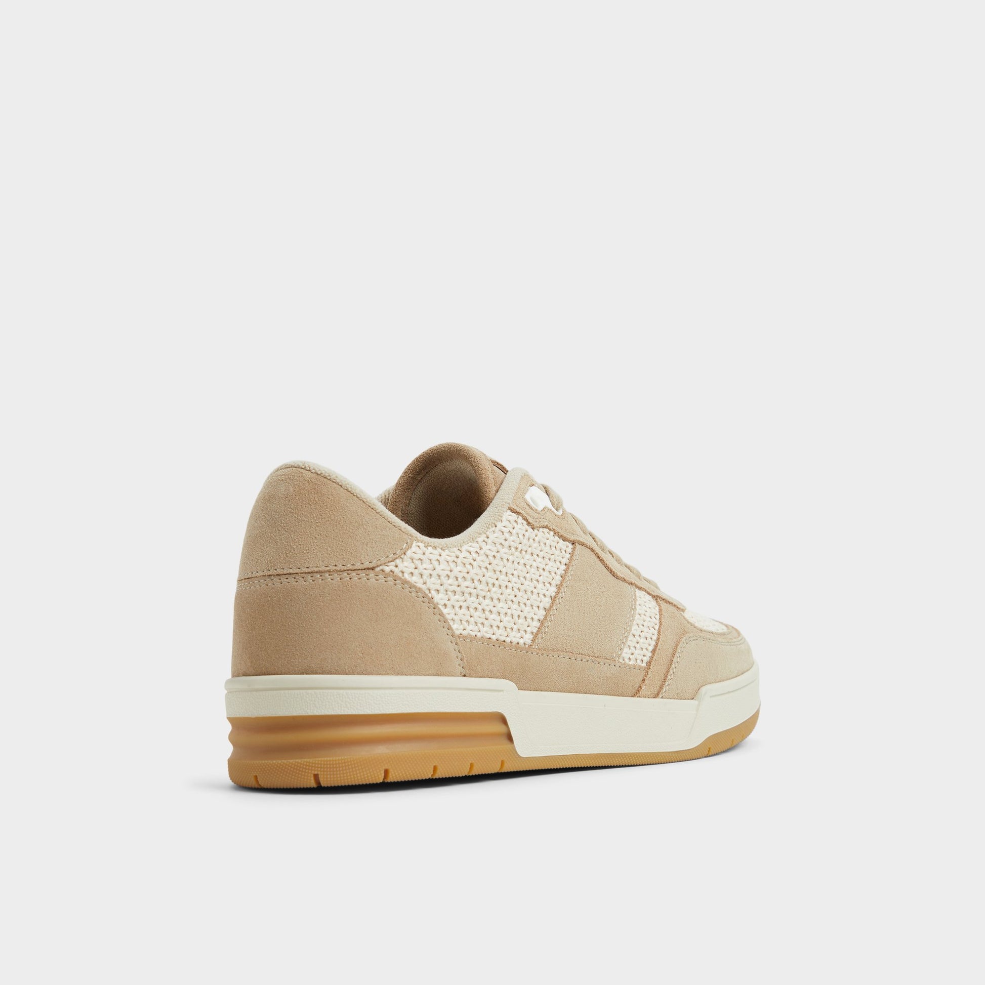 Three-quarter angle of Natural Topper Low top sneaker's back side