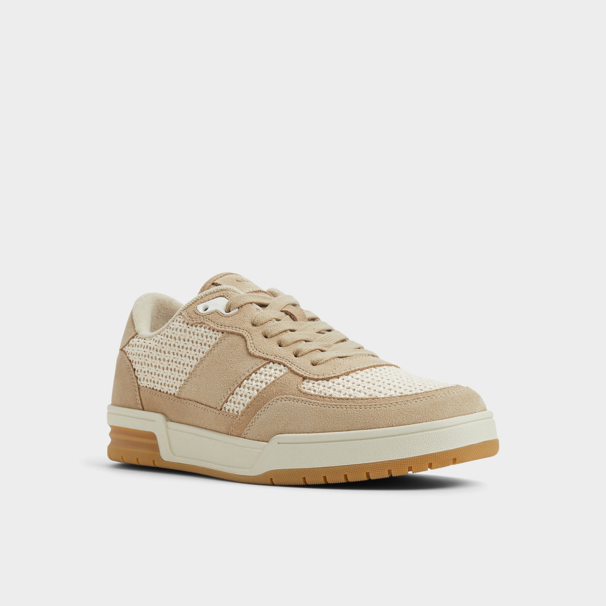 Three-quarter angle of Natural Topper Low top sneaker's front side