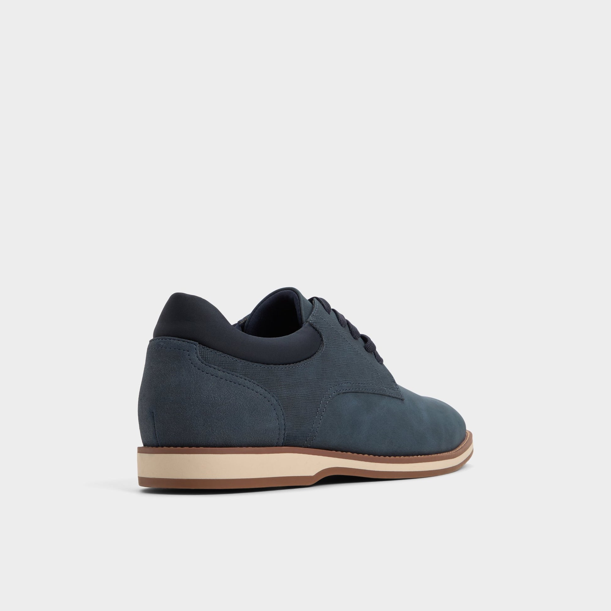 Three-quarter angle of Navy Ccorby Oxford shoe's back side