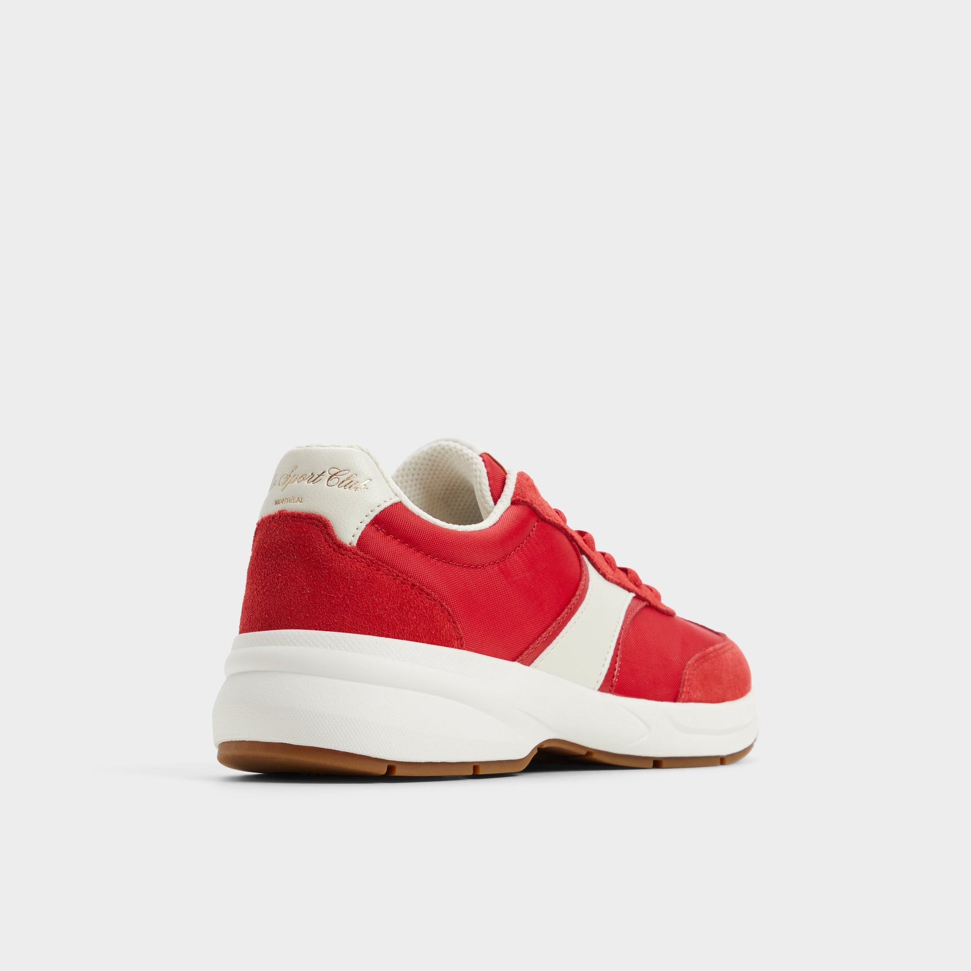 Three-quarter angle of Medium Red Clubchic Jogger sneaker's back side