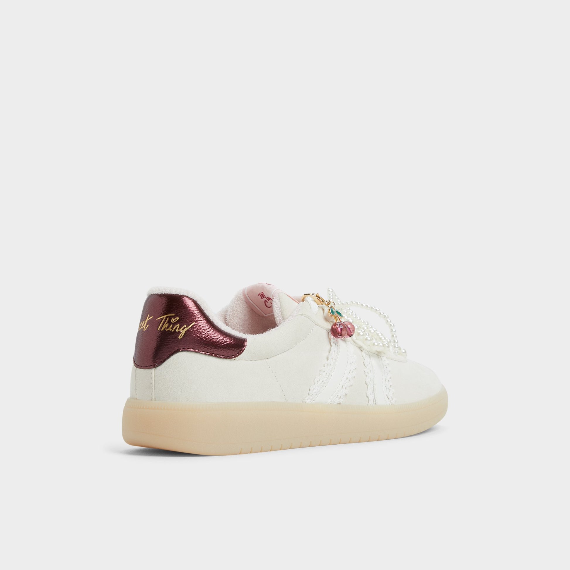 Three-quarter angle of White/Bone Sweetthing Low top sneaker's back side