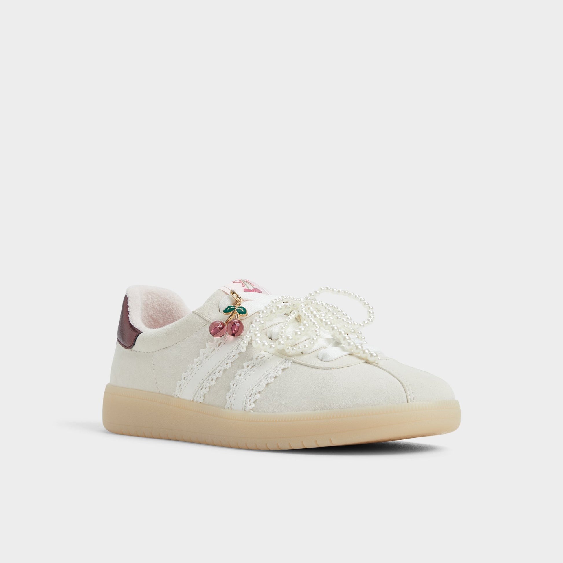 Three-quarter angle of White/Bone Sweetthing Low top sneaker's front side
