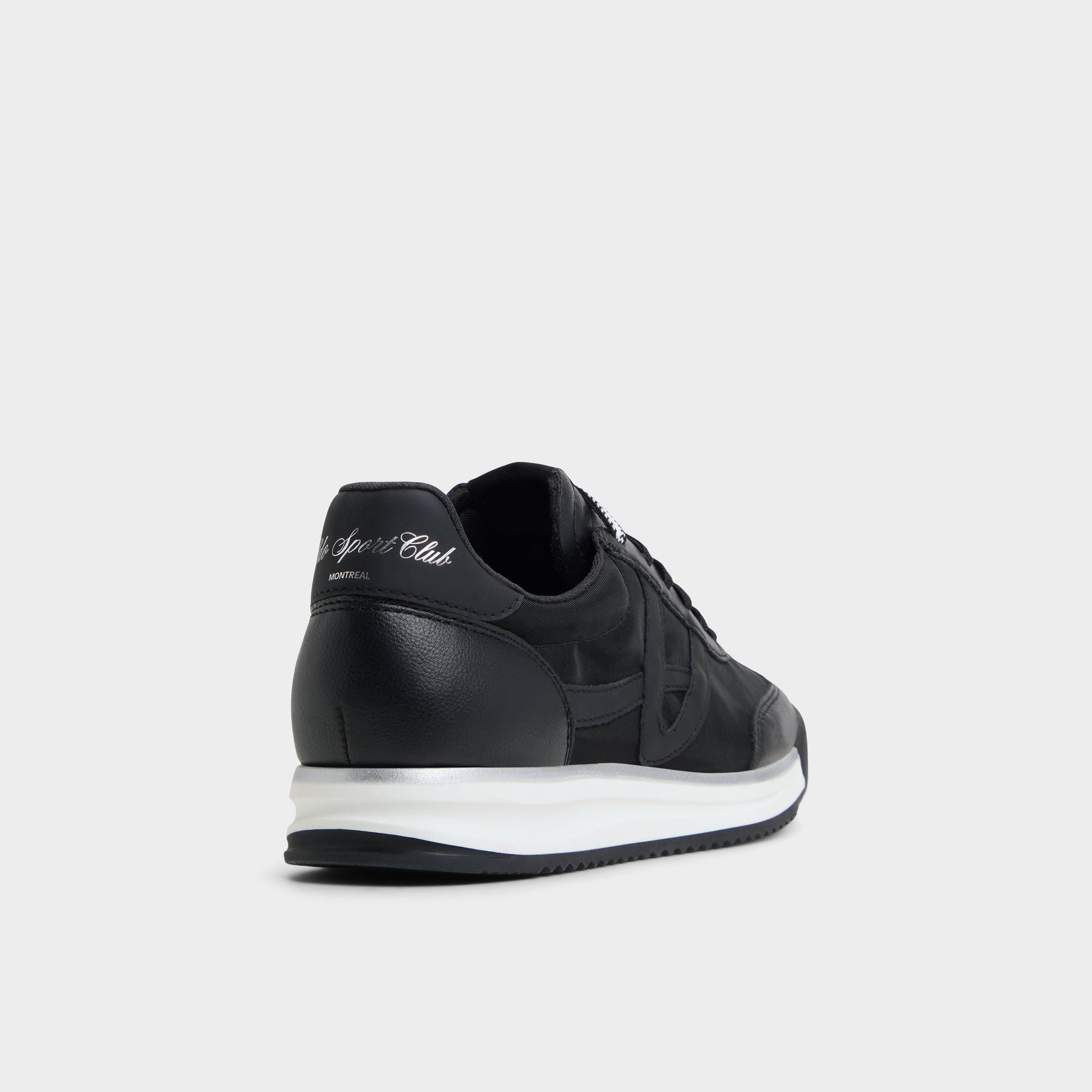 Three-quarter angle of Black Stepcount Jogger sneaker's back side
