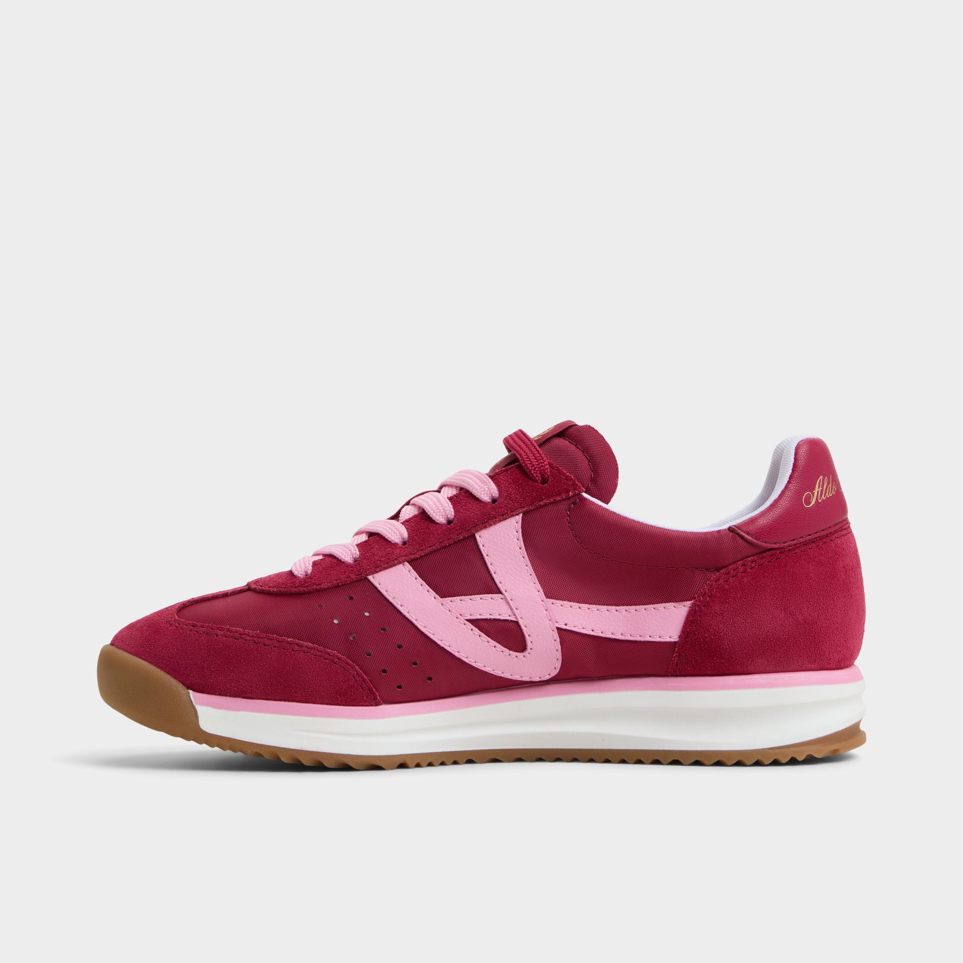 Side view of Dark Pink Stepcount Jogger sneaker