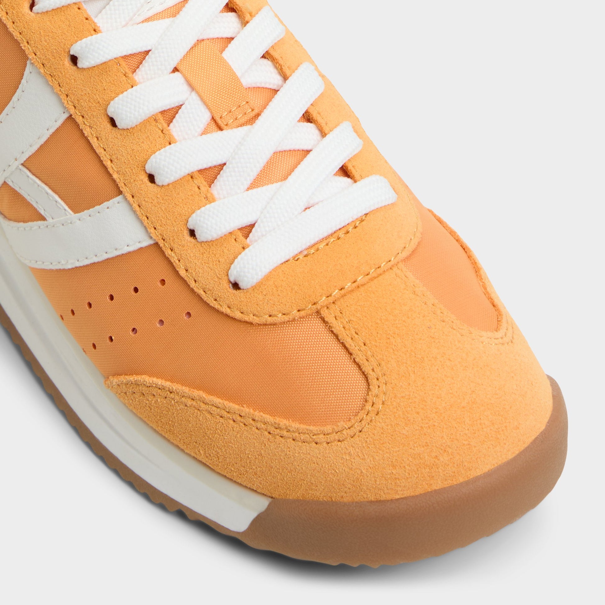 Close-up of the Orange Stepcount Jogger sneaker