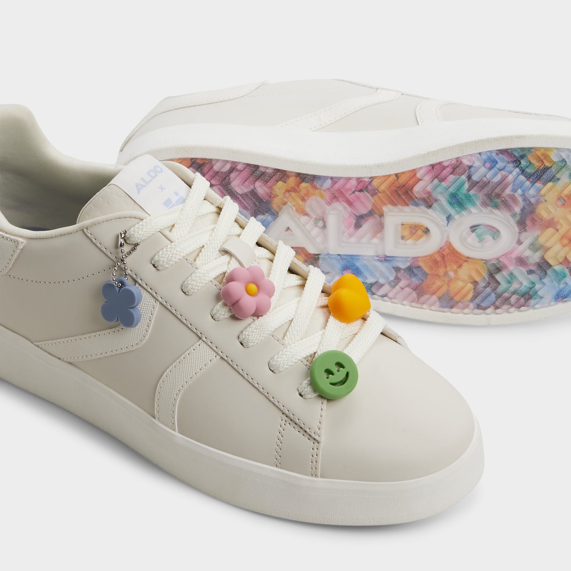 Highlighted view of a pair of Other White Hyperthalamuscorp Men's low top sneakers