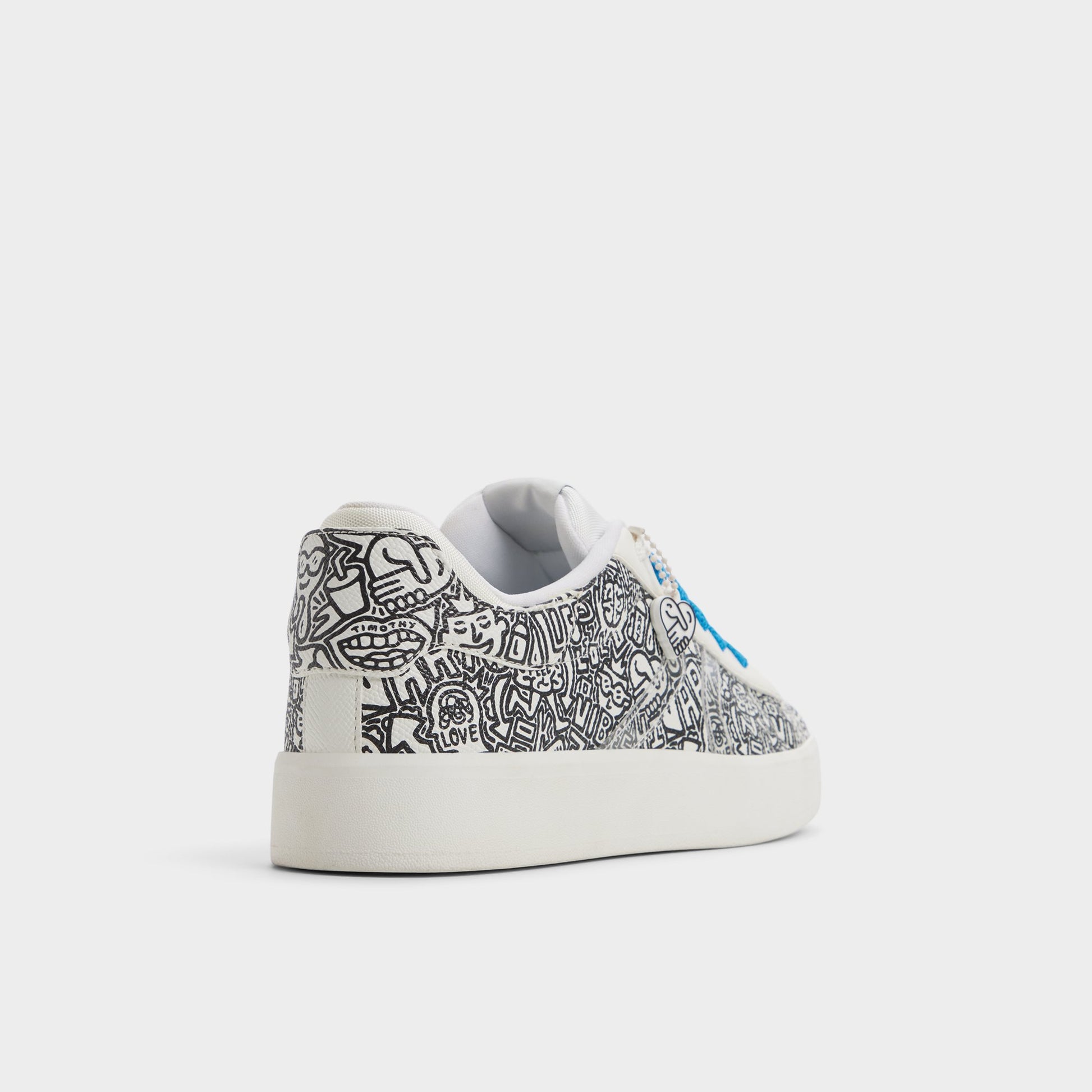 Three-quarter angle of White/Black Timothy Goodman Women's low top sneaker's back side