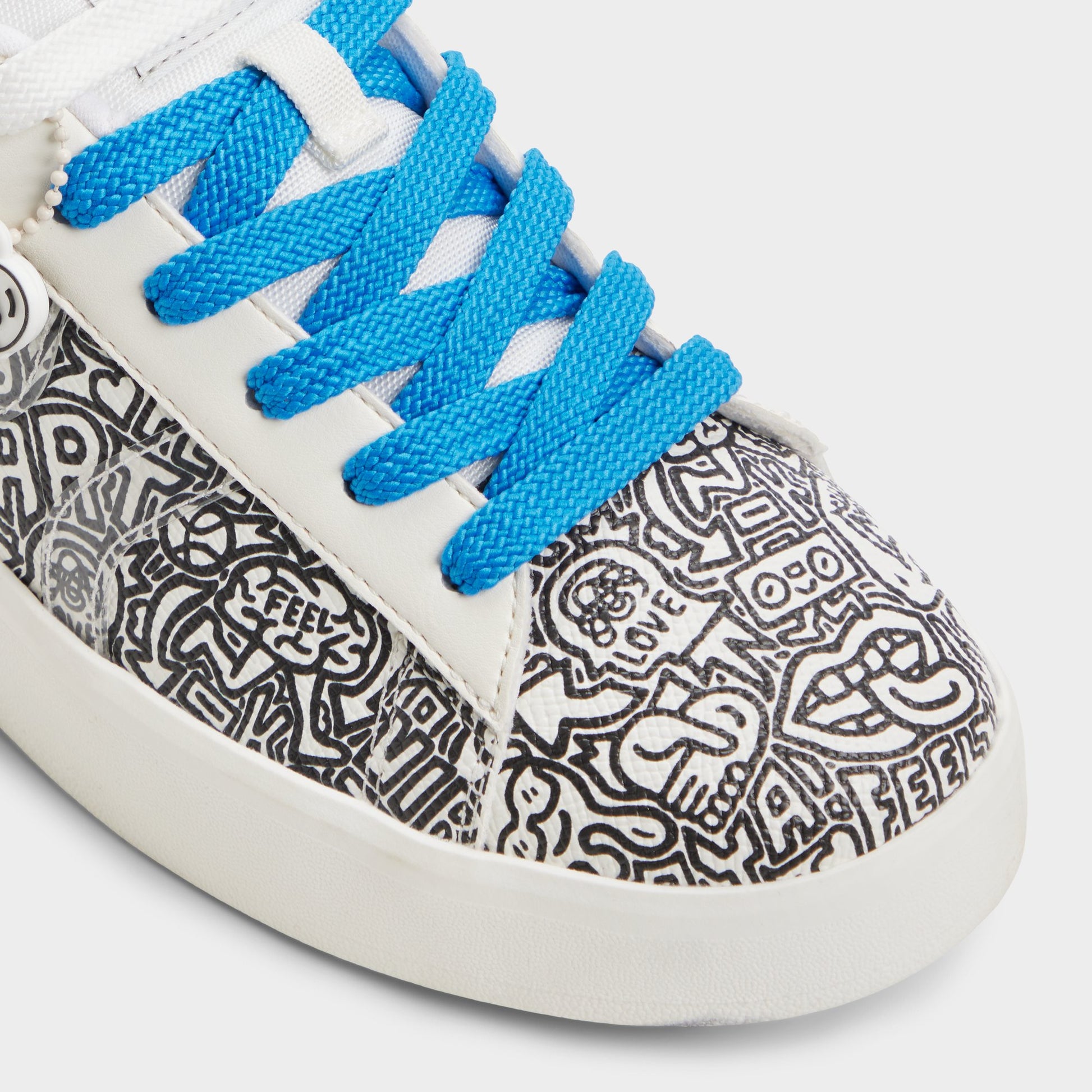 Close-up of the White/Black Timothy Goodman Women's low top sneaker