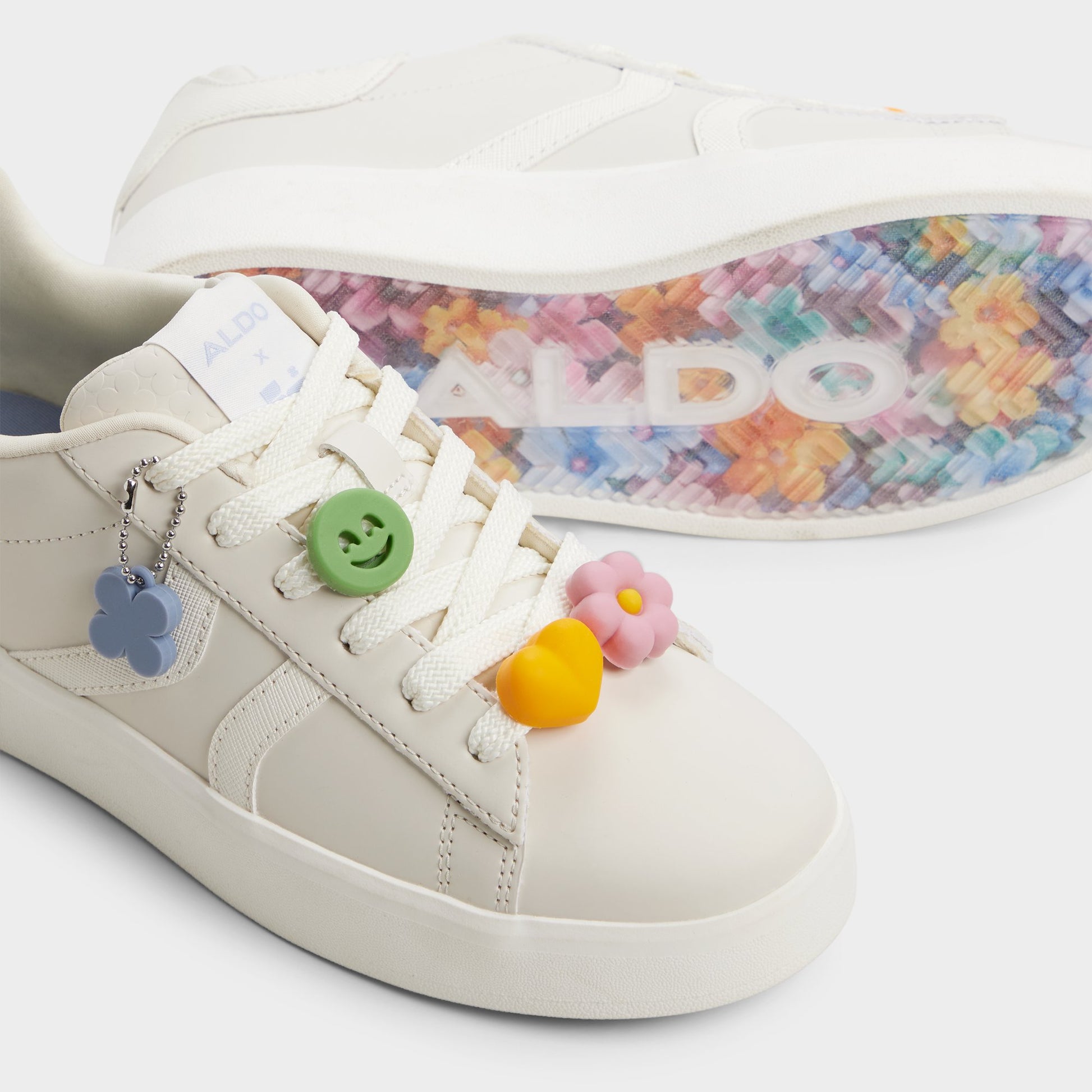 Highlighted view of a pair of Neutral Hyperthalamuscorp Women's low top sneakers