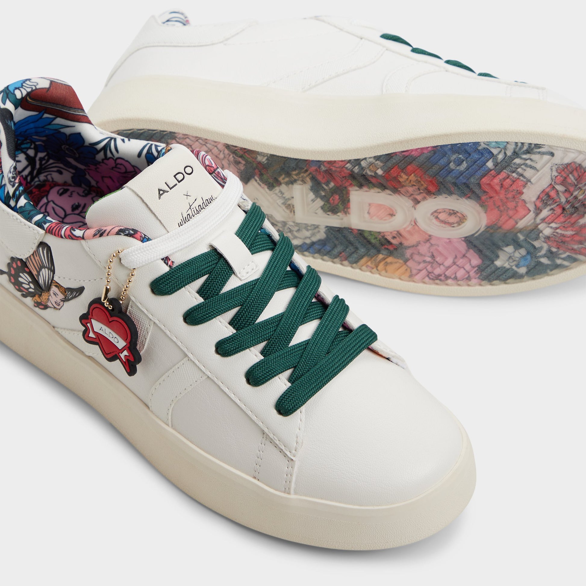 Highlighted view of a pair of White multi Whatisadam Women's low top sneakers