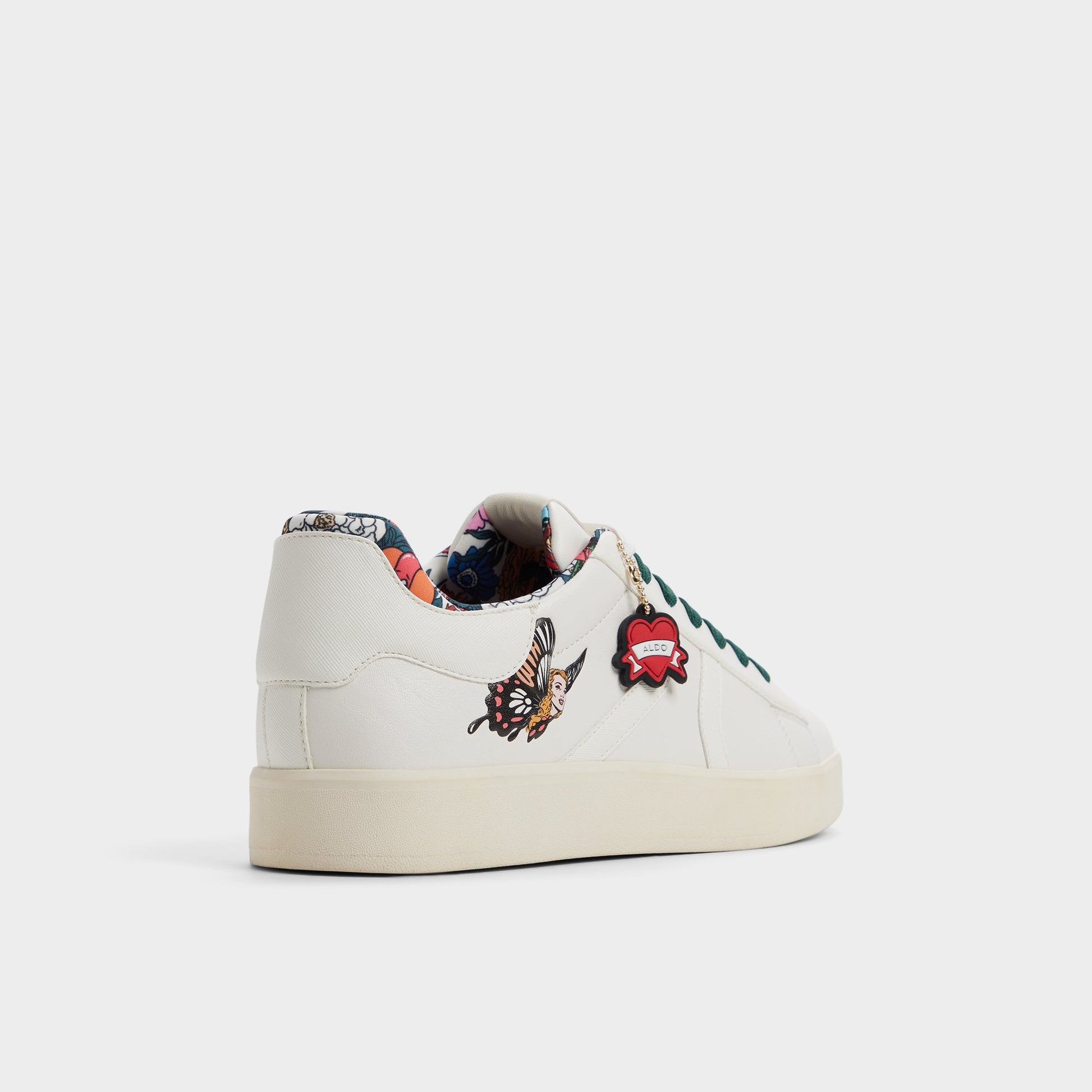 Three-quarter angle of White combo Whatisadam Men's low top sneaker's back side