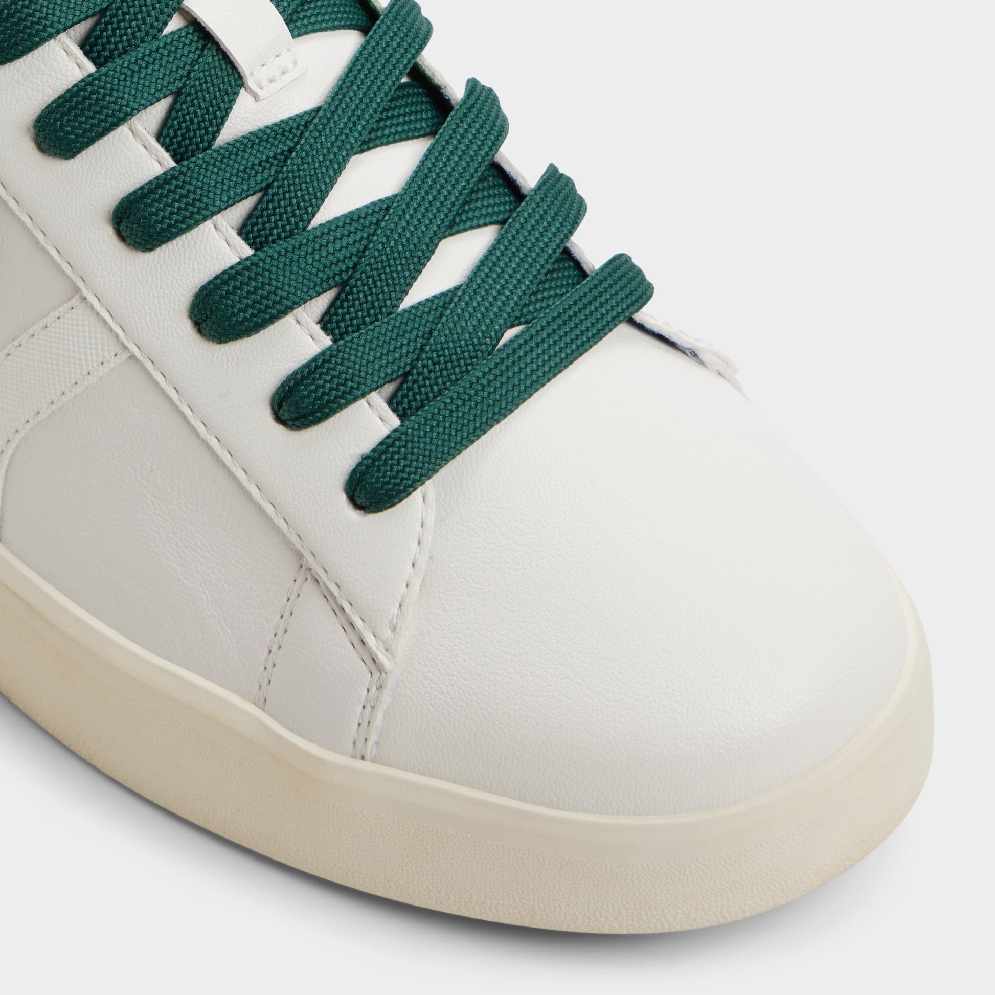 Close-up of the White combo Whatisadam Men's low top sneaker