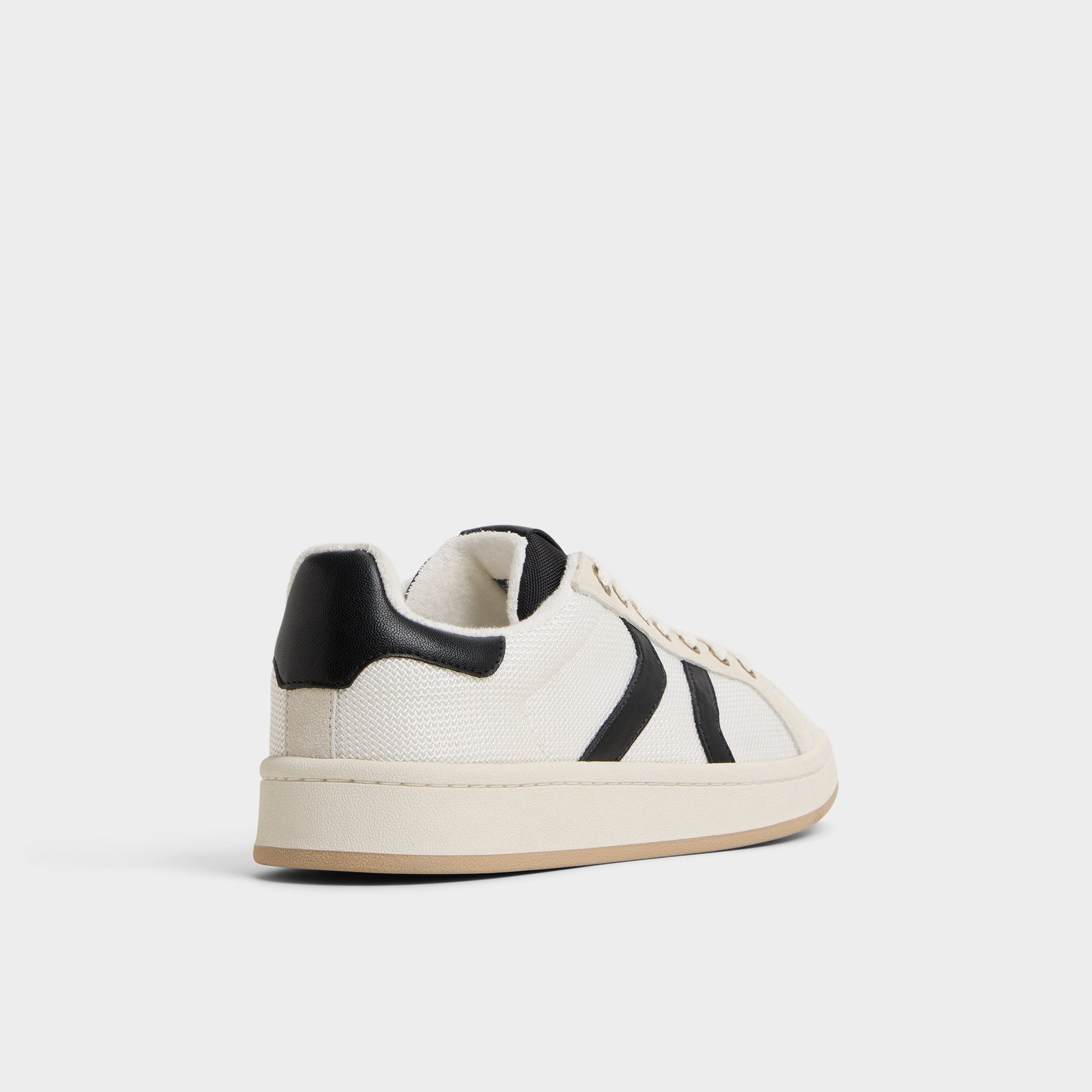 Three-quarter angle of White Retrokicks Low top sneaker's back side