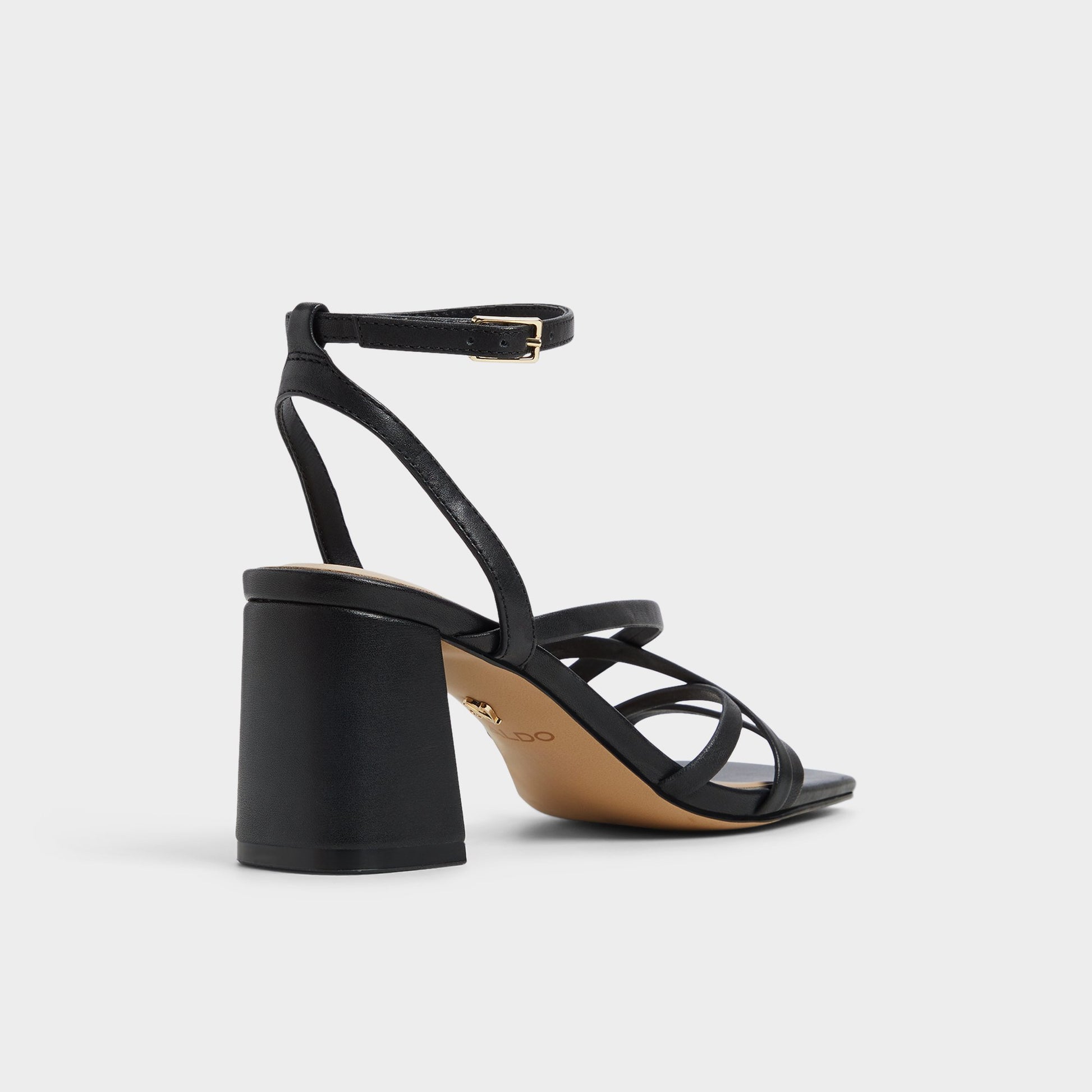 Three-quarter angle of Black Esther Strappy heeled sandal's back side