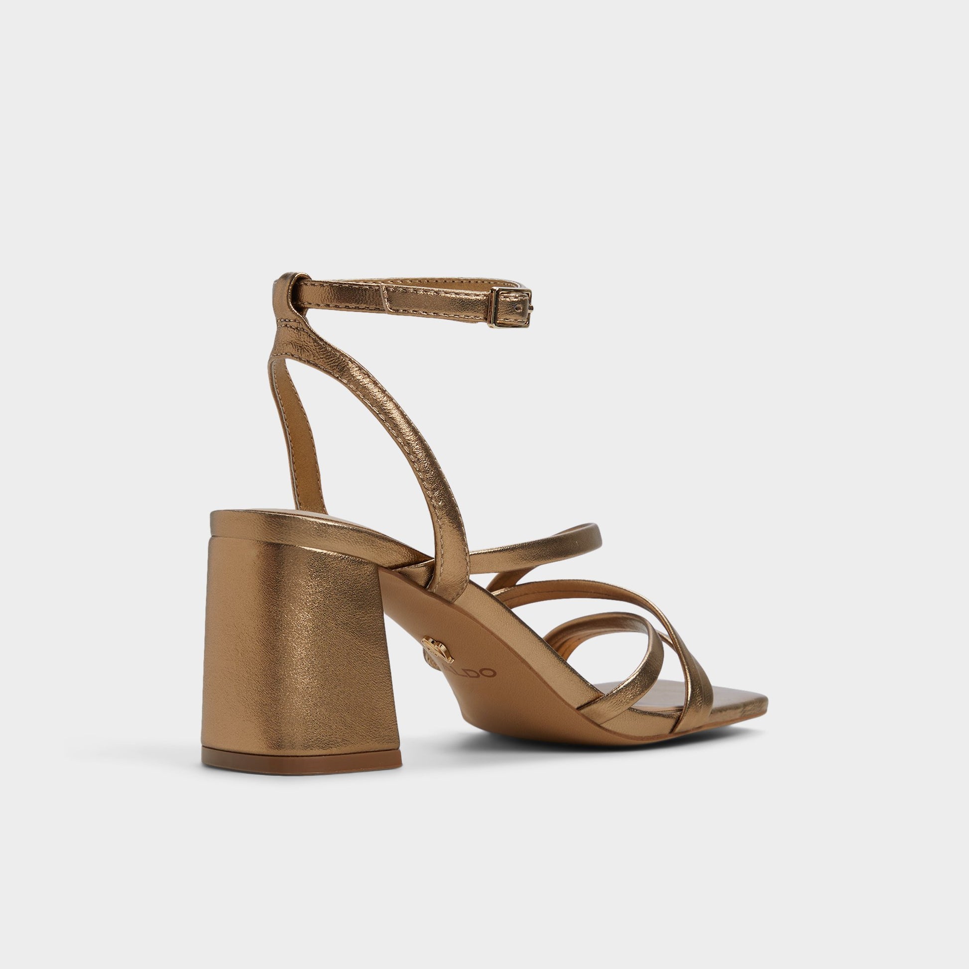 Three-quarter angle of Gold Esther Strappy heeled sandal's back side