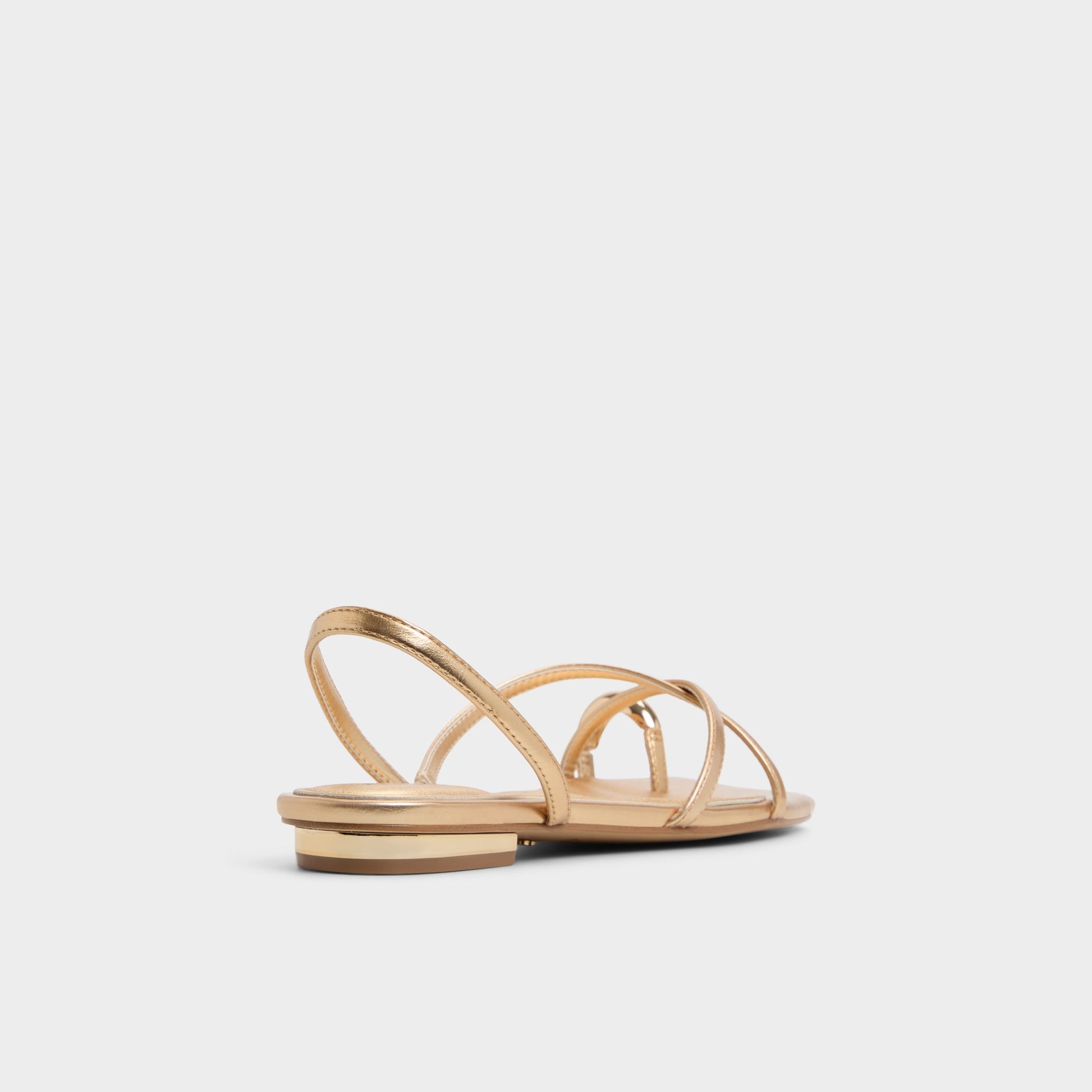 Three-quarter angle of Gold Synthesa Flip flop's back side