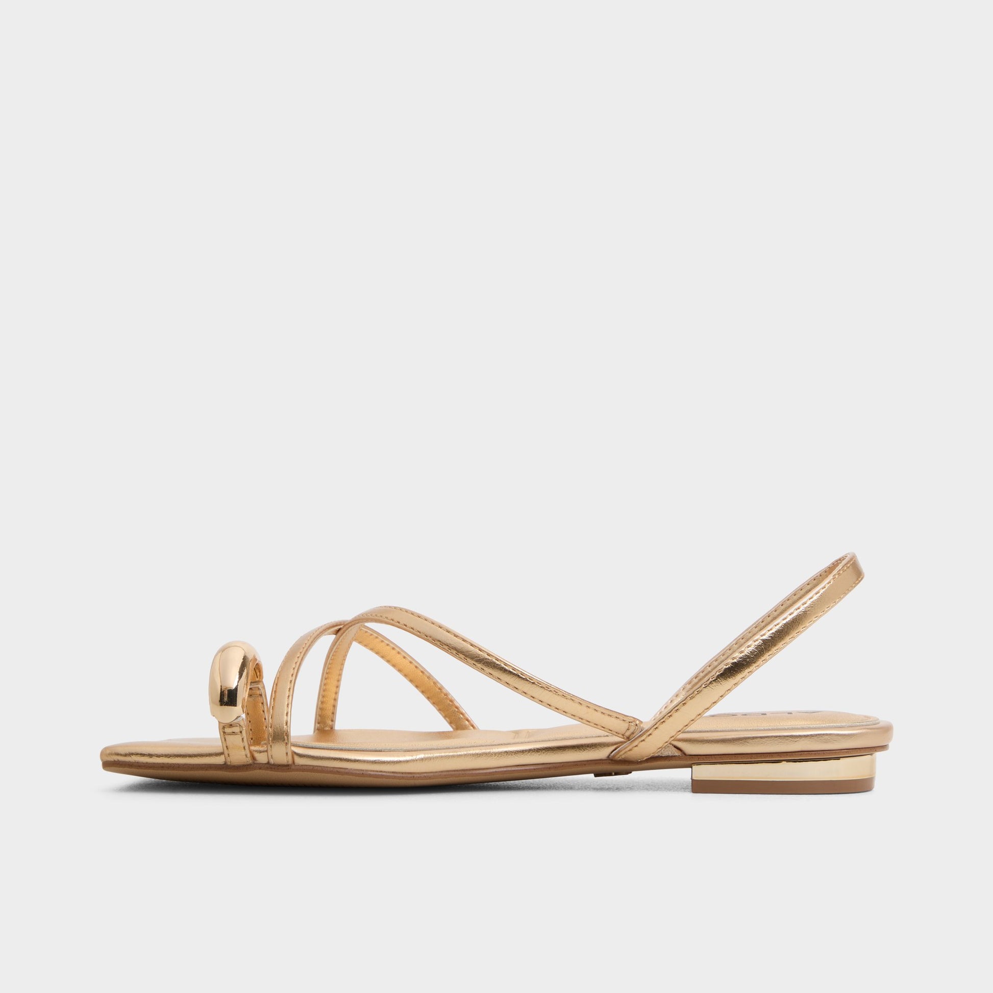 Side view of Gold Synthesa Flip flop