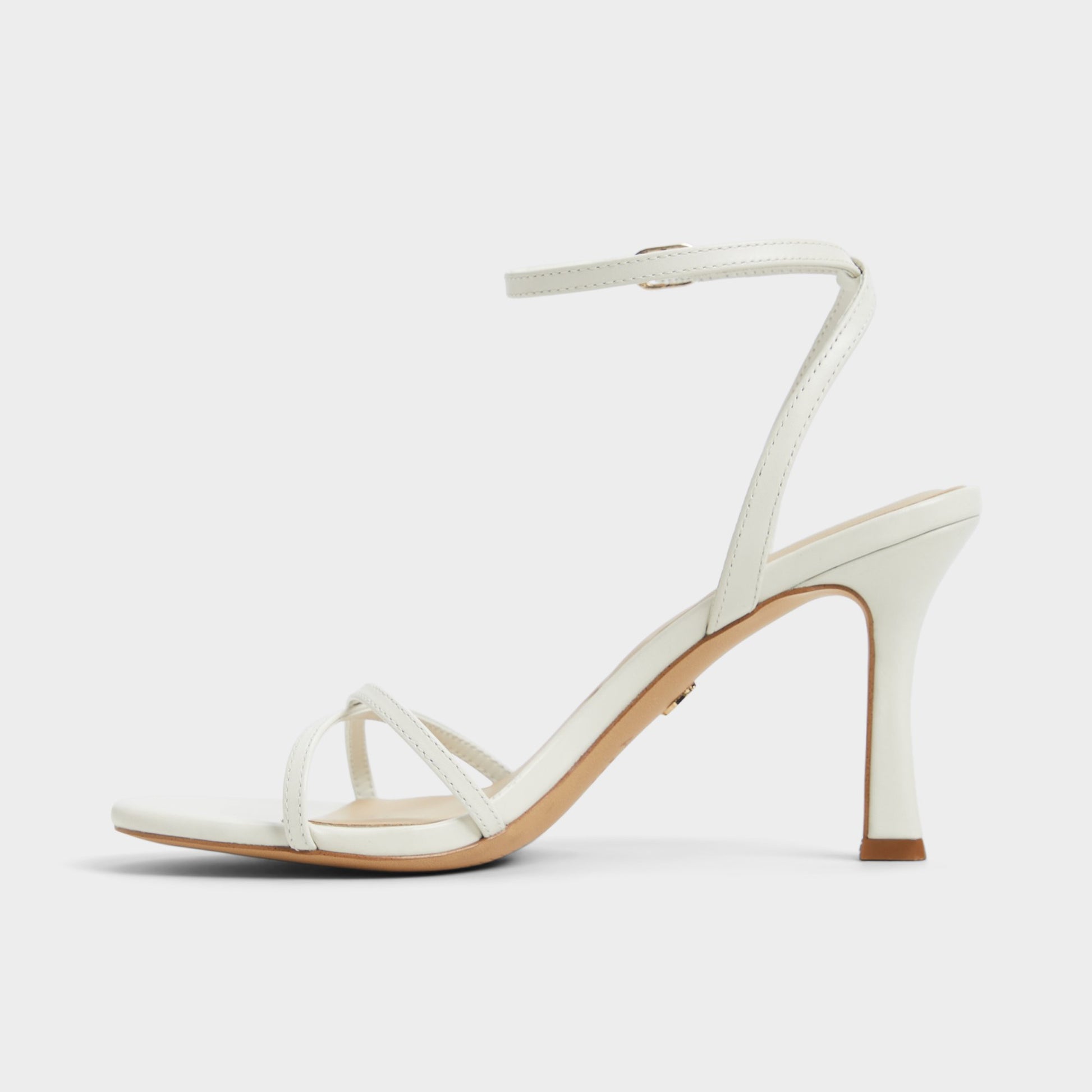 Side view of White/Bone Marbela Strappy heeled sandal