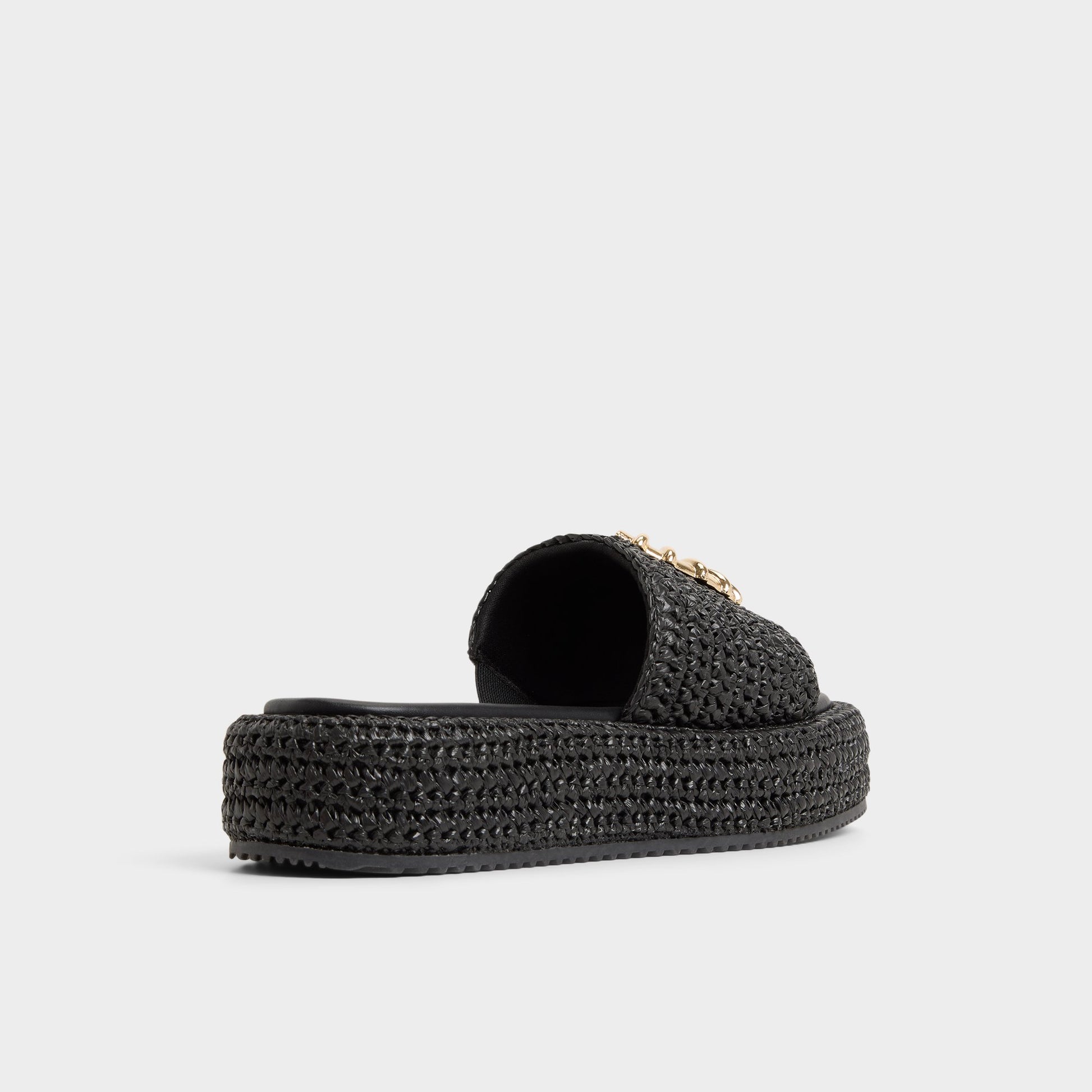 Three-quarter angle of Black Justbeachy Flatform sandal's back side