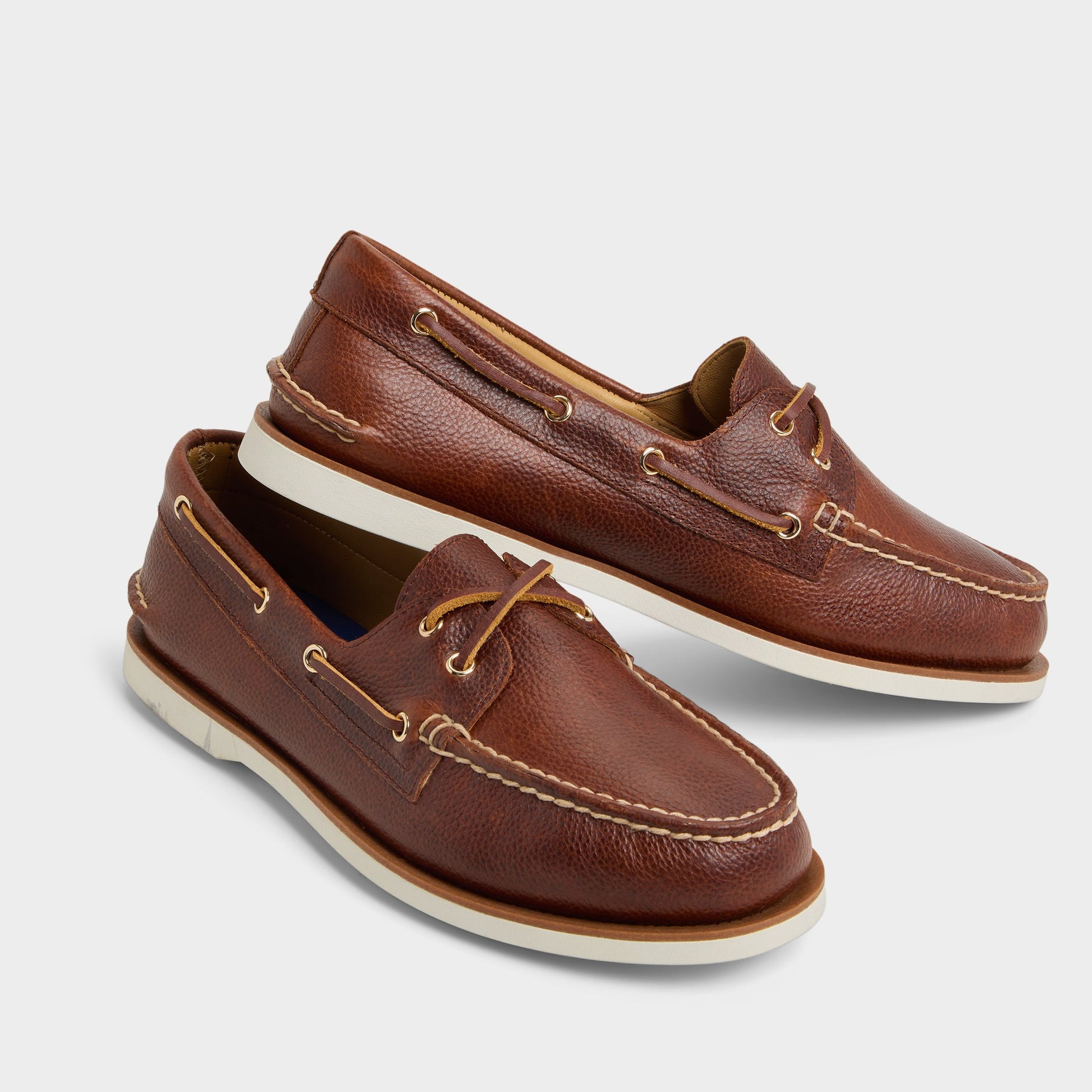 Highlighted view of a pair of Medium Brown Chico Boat shoes