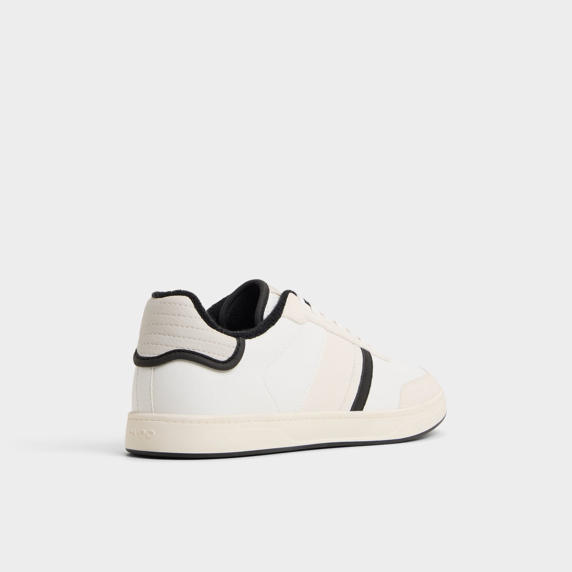 Three-quarter angle of White Freekick Low top sneaker's back side