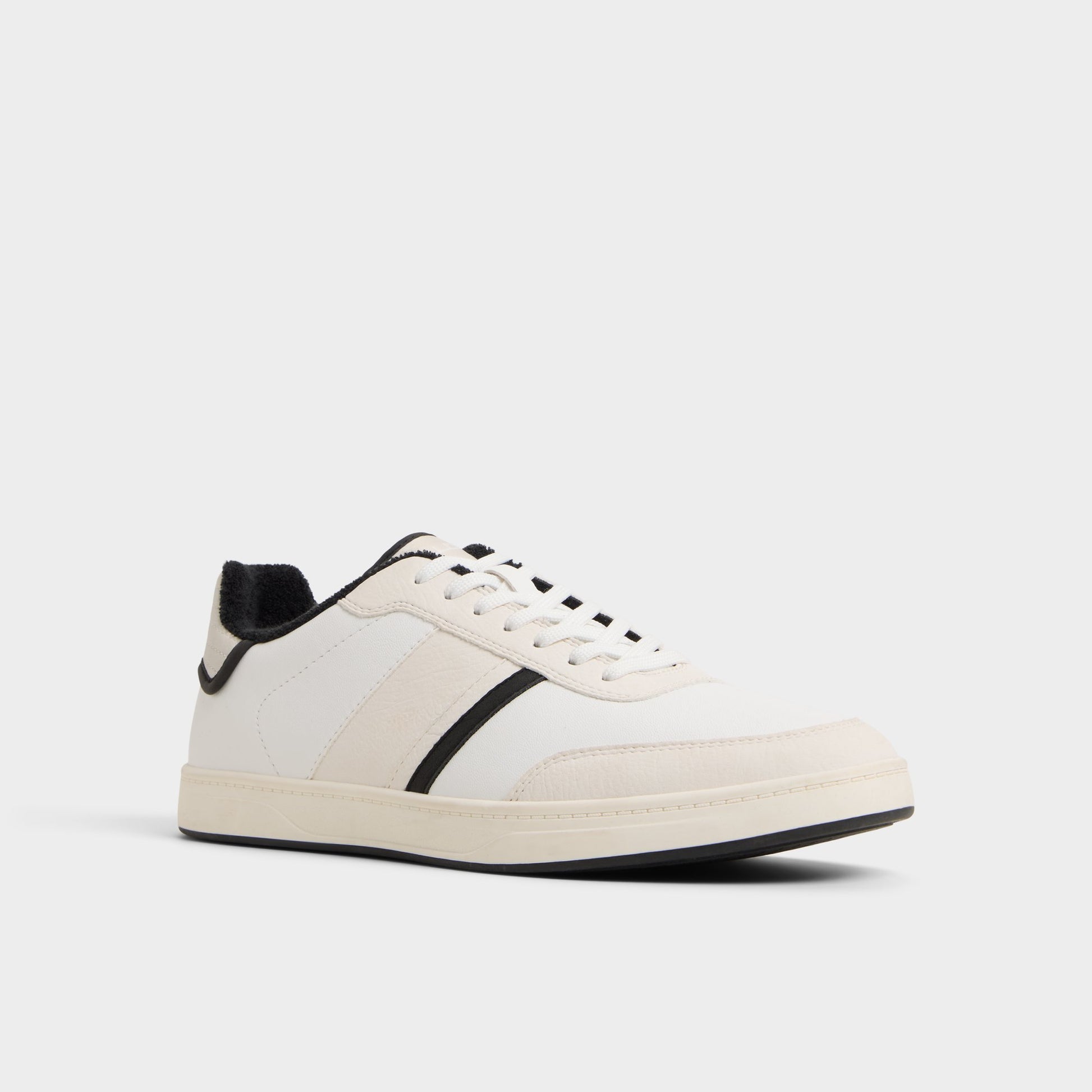 Three-quarter angle of White Freekick Low top sneaker's front side