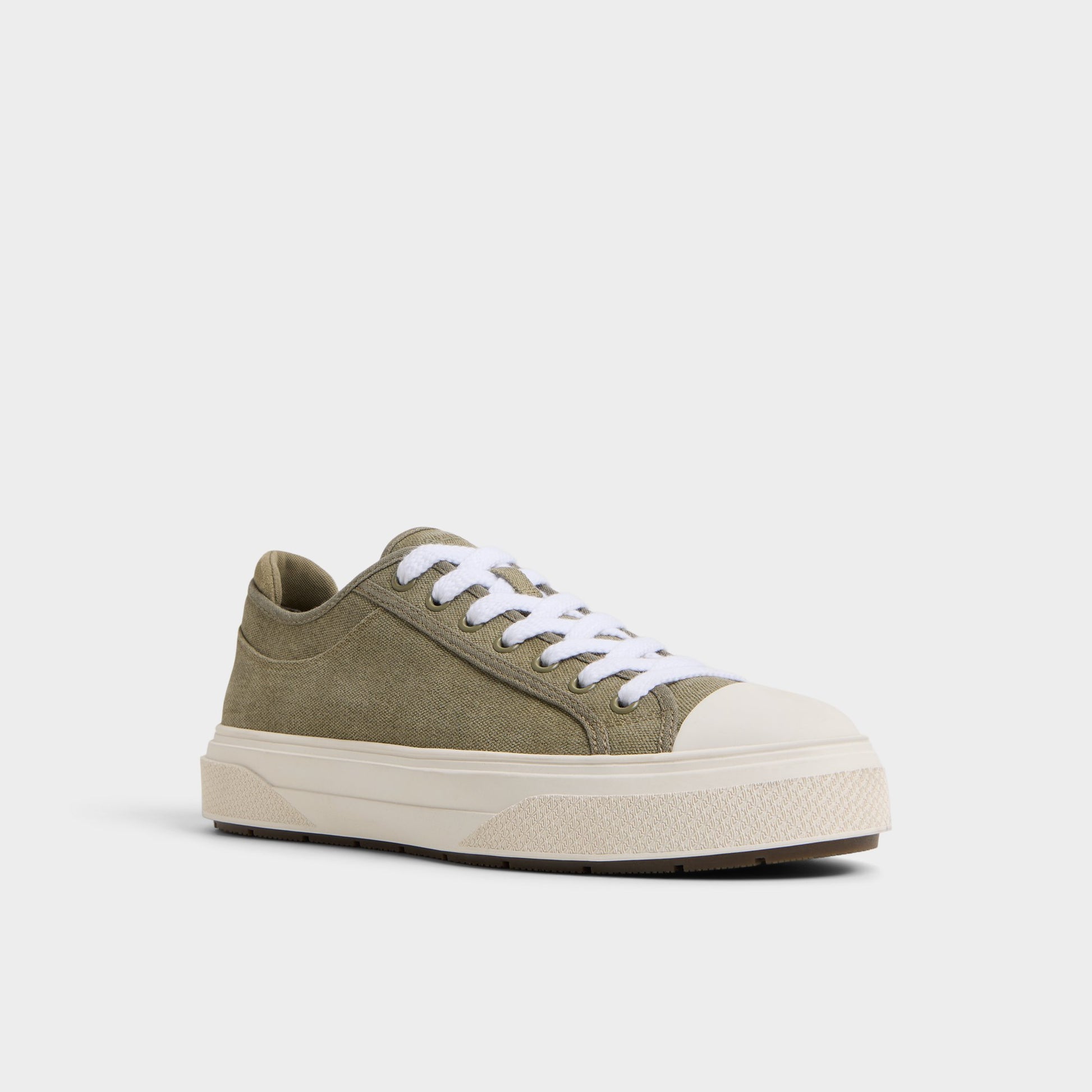 Three-quarter angle of Khaki Colin Low top sneaker's front side