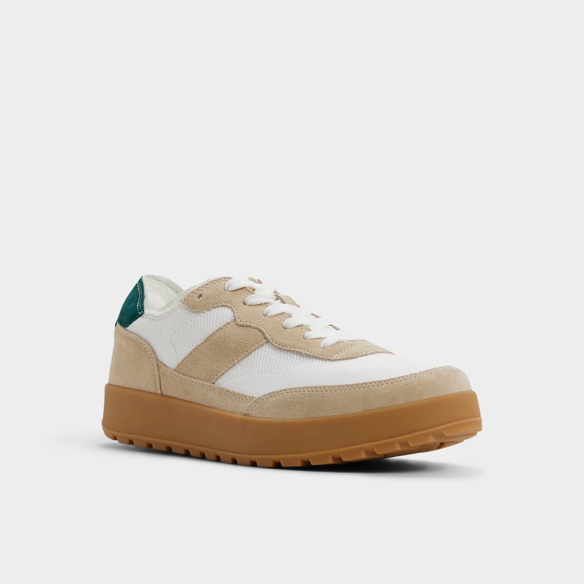 Three-quarter angle of White Julius Low top sneaker's front side