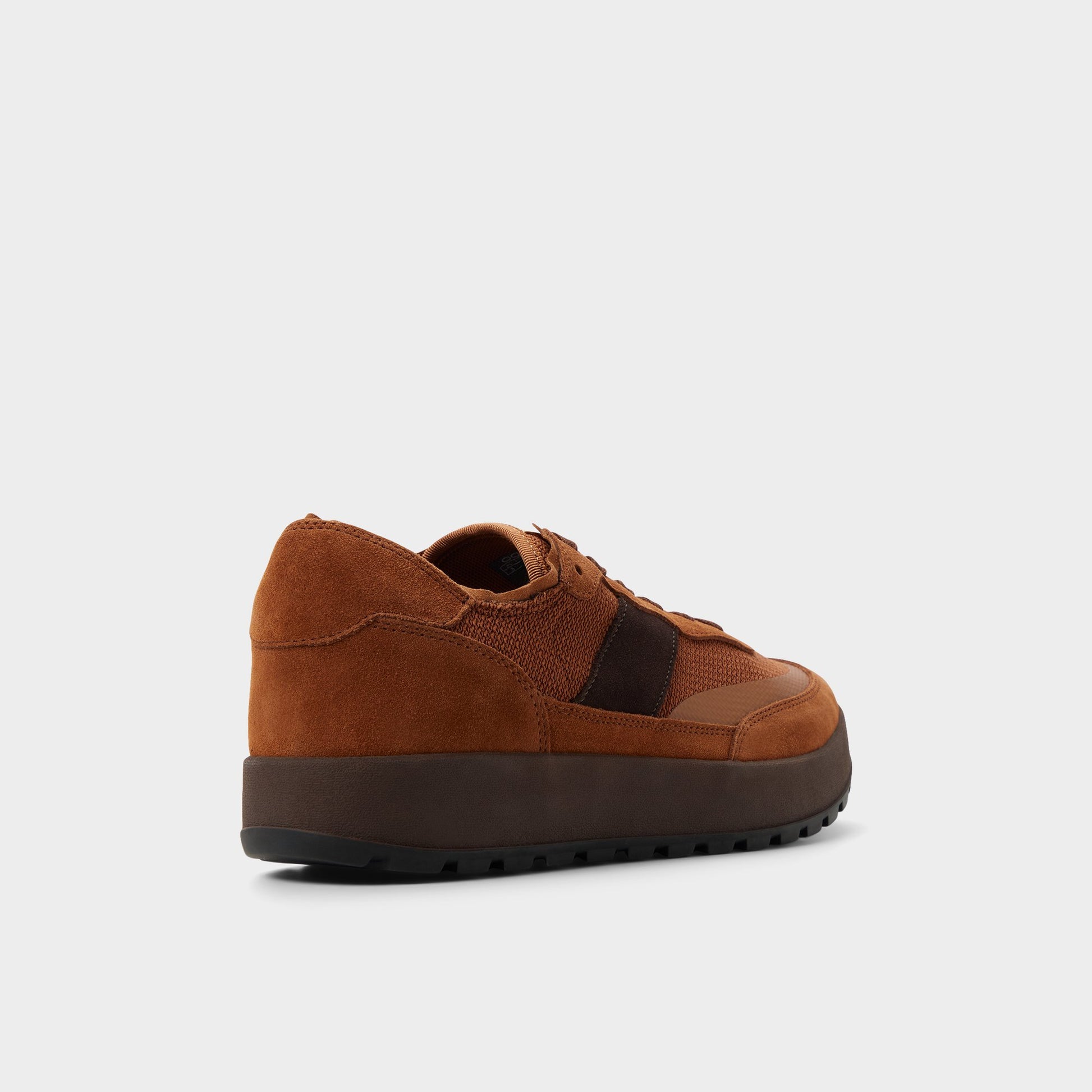 Three-quarter angle of Brown Overflow Julius Low top sneaker's back side