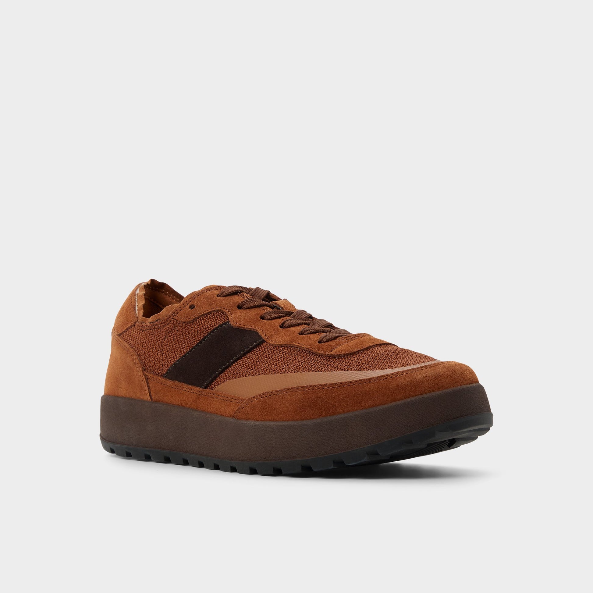 Three-quarter angle of Brown Overflow Julius Low top sneaker's front side